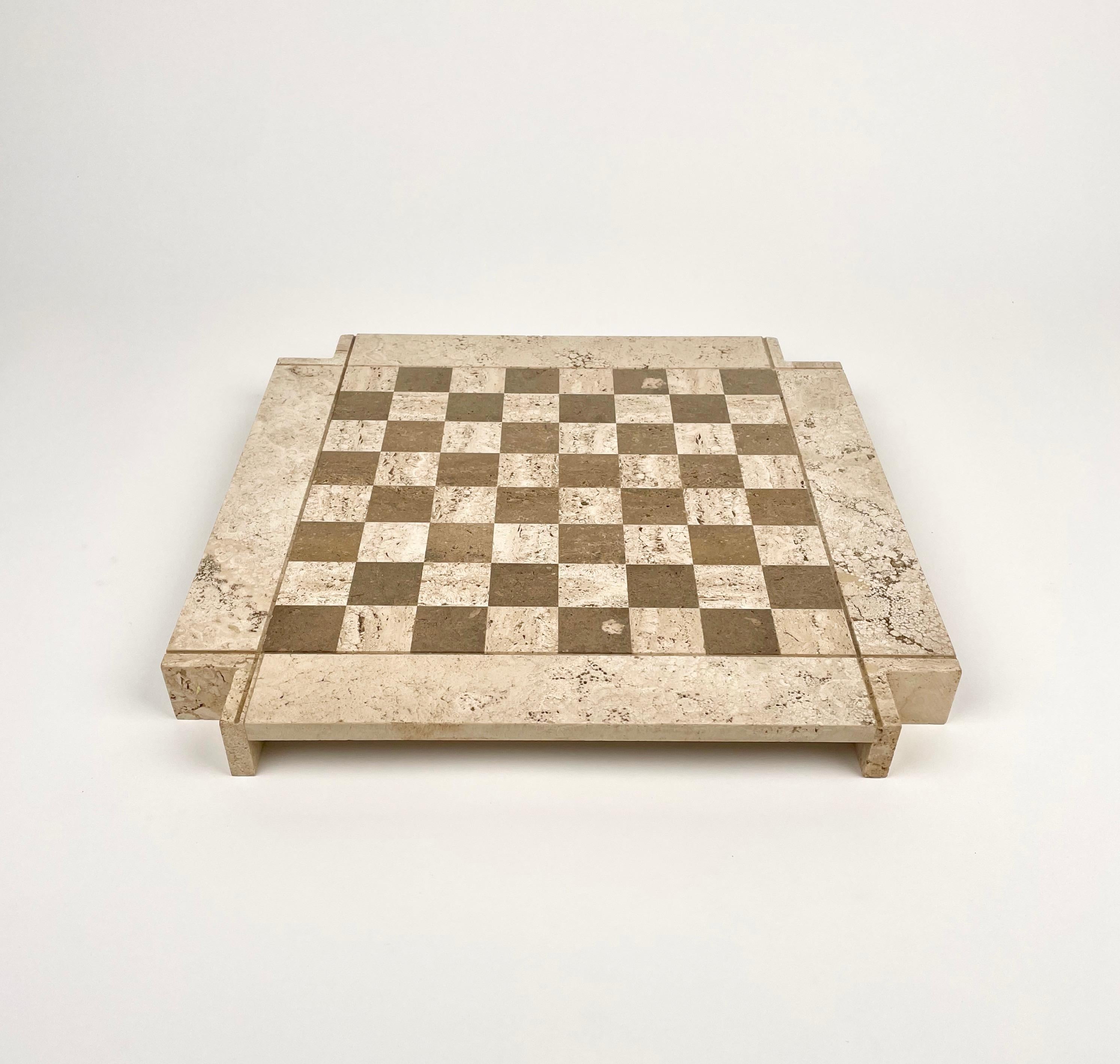 Rare modernist chess game in two colored travertine in the style of Italian design Angelo Mangiarotti.

Made in Italy in the 1970s.

The minimalistic design of this game set will make a fine table top accessory in any room.