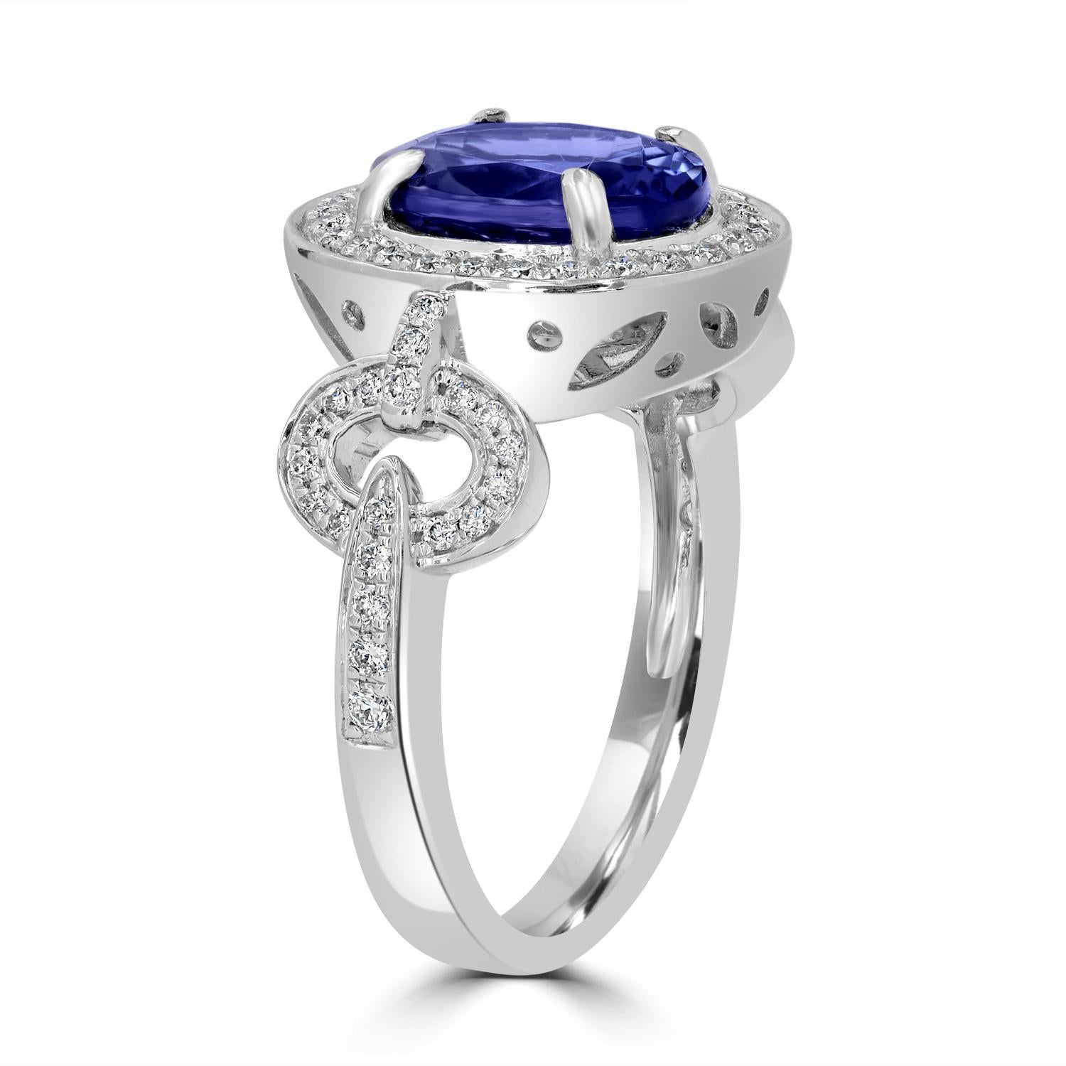 Taglio ovale Anello bicolore con tanzanite non riscaldata e diamanti in vendita