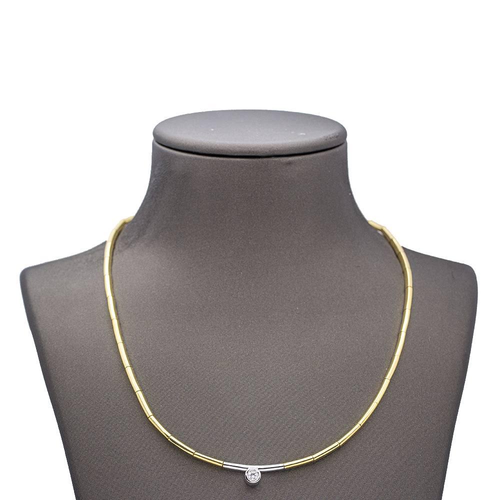 Bicolour gold necklace for woman  1x Brilliant cut diamond weighing 0,16ct. in G/VS quality  18kt white gold and 18kt yellow gold  20,80 grams.  Semi hollow  Drawer clasp with safety catch  Length: 43cm  Brand new product  Ref: D359661LF