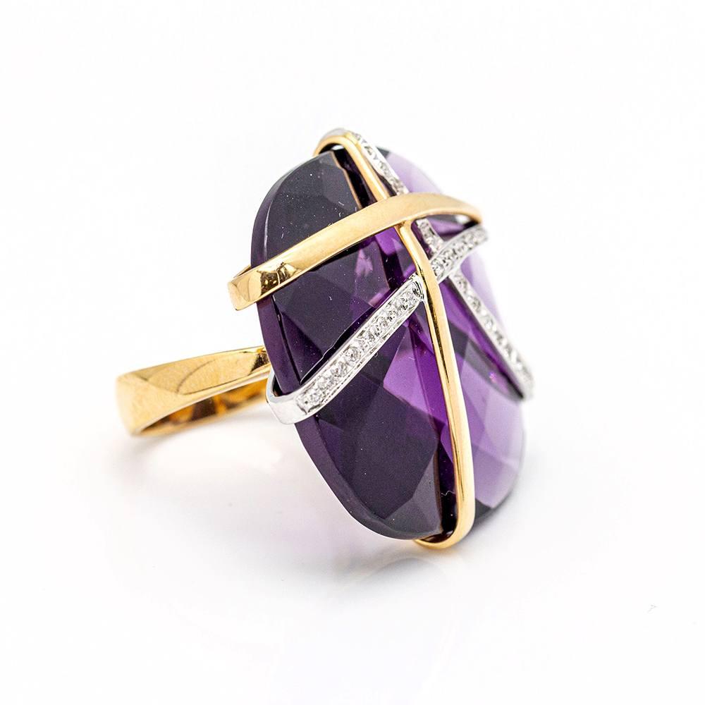 Ring in Bicolour Gold and Amethyst for woman  31x Brilliant Cut Diamonds with a total weight of 0,21cts. in G/VS quality  1x Brazilian Amethyst of 8,00ct.  Size 15,5 can be adapted to other sizes (ask for quotation)  18kt Yellow Gold and White Gold 