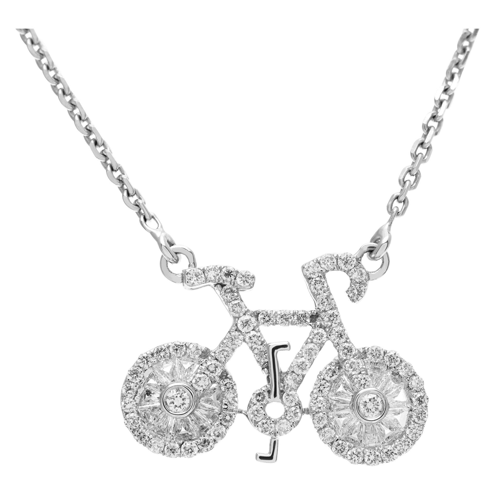 Pave diamond bicycle pendant necklace set in 18k white gold with approximately 0.35 carats of diamonds. The legth of the necklace can be 18'', 17'', or 16''.