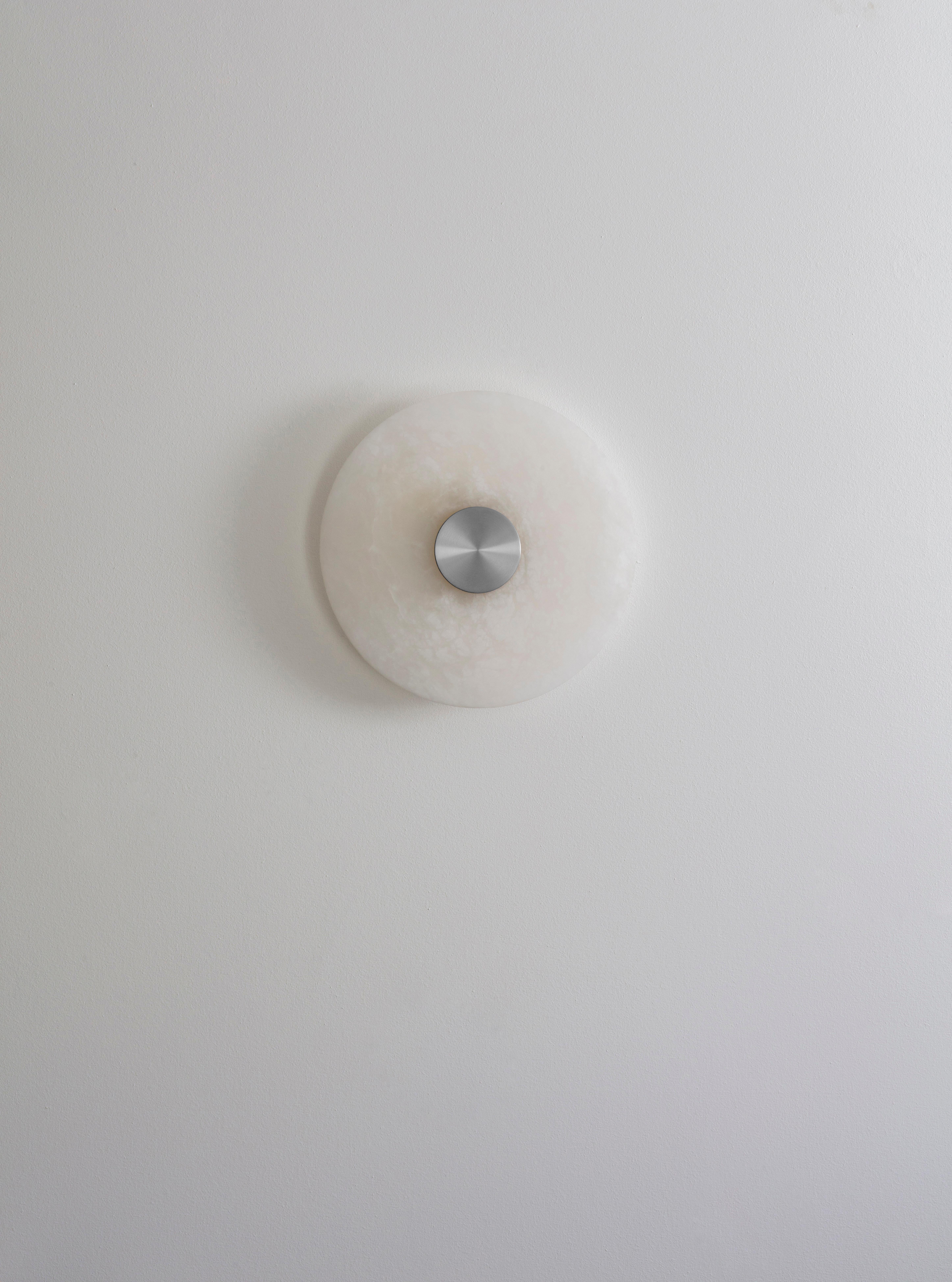 Bide large wall light Nickel by Bert Frank
Dimensions: D 28 x H 6 cm
Materials: Nickel, Alabaster

All our lamps can be wired according to each country. If sold to the USA it will be wired for the USA for instance.

When Adam Yeats and Robbie