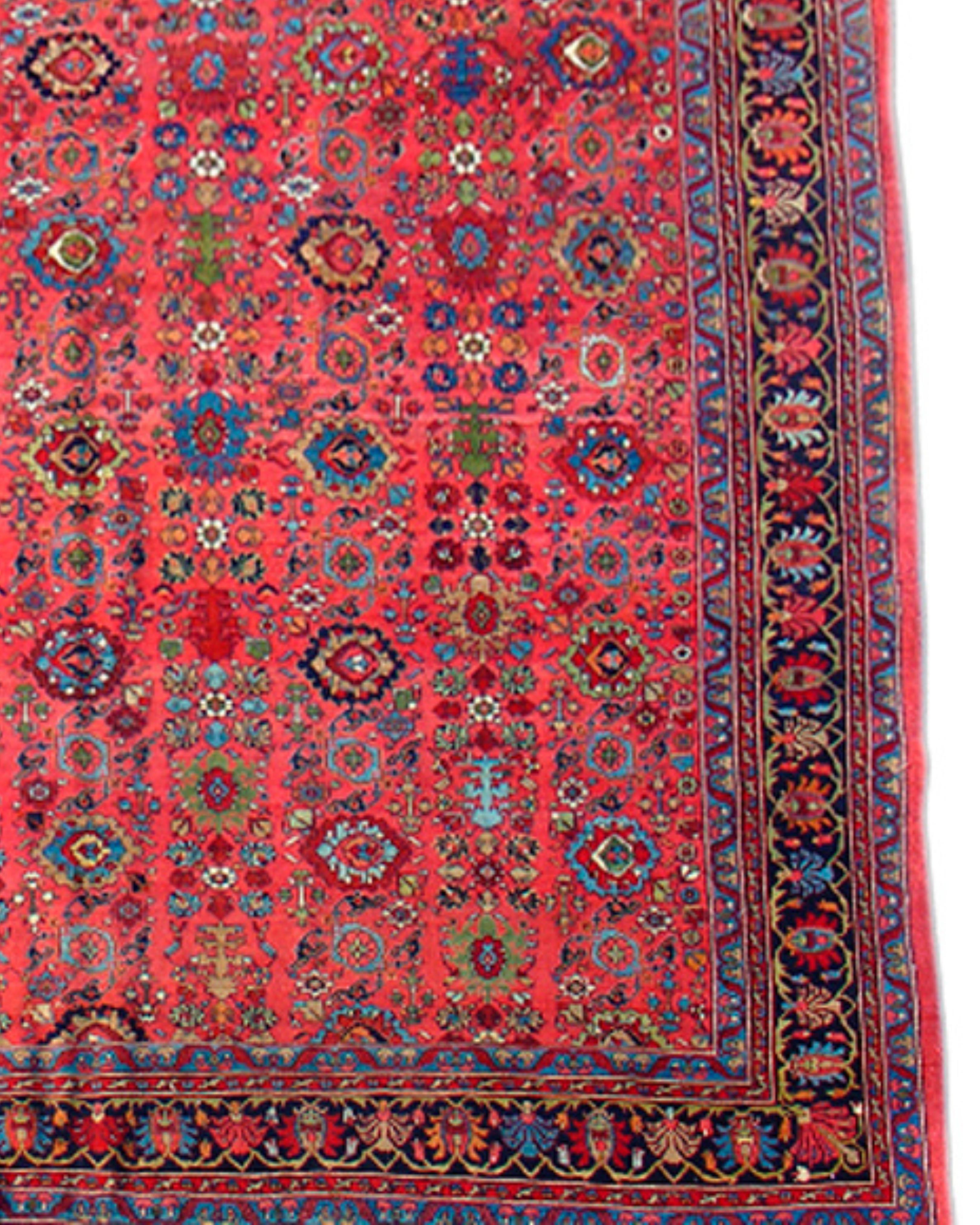 Antique Oversized Large Persian Bidjar Carpet, Early 20th Century

Woven with the sturdy construction for which Bidjar carpets are renowned, this over-sized piece glistens with a rich jewel-like palette of color. Ruby, emerald and aquamarine hues
