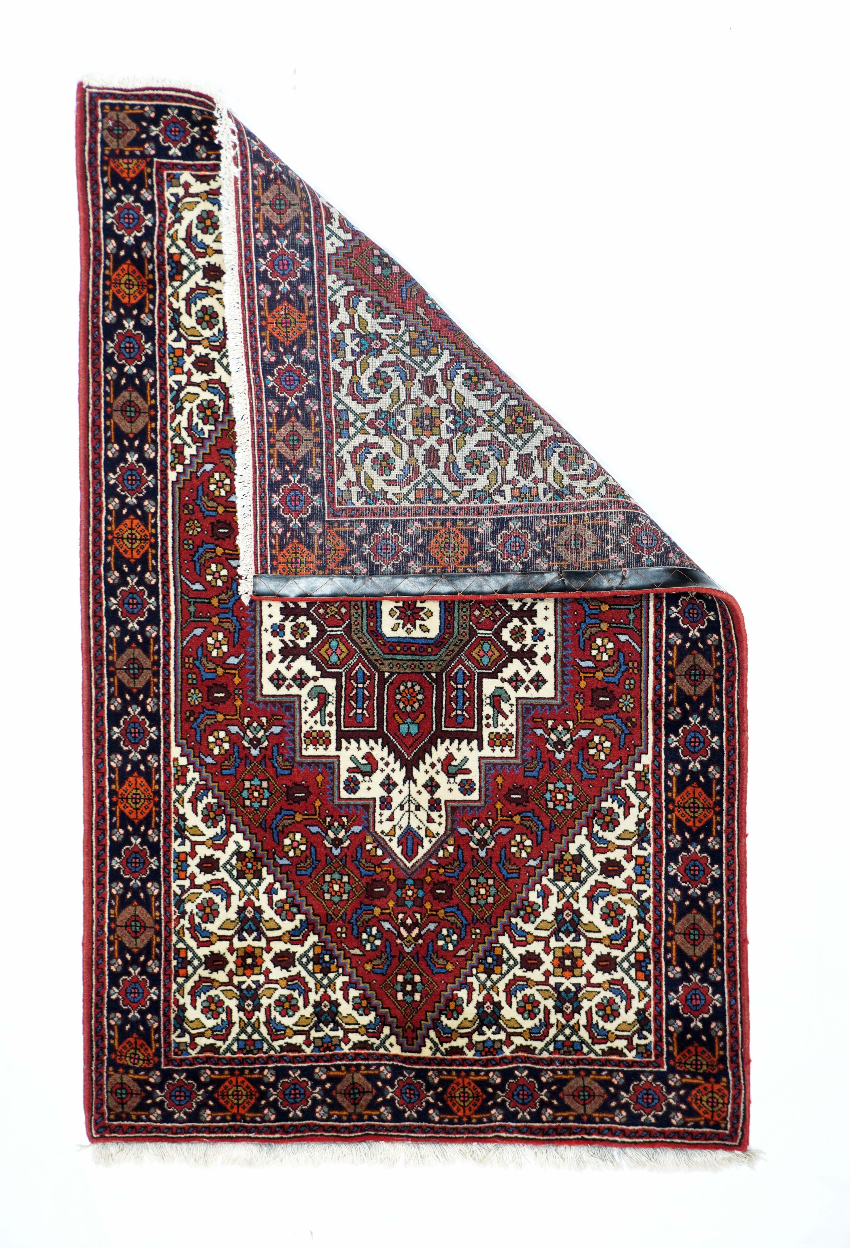 Bidjar Rug 3.3'' x 5.1''. A larger version of our 1145-1146 scatters. The iconic navy border of cartouches and sectioned octagons, frames the ivory Herati-patterned field with its stepped and pointed coral Herati upright hexagon subfield. The