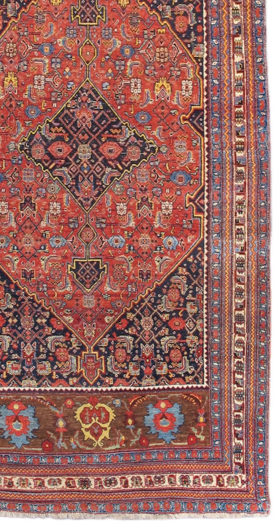 This exceedingly pleasing Bidjar runner approaches the long and narrow format in a playful and novel manner. During the late 19th century the Kurdish town of Bijar and its surrounding area became a major Persian carpet producing center, weaving a