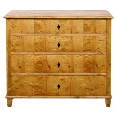 Biedermeier 19th Century Maple Wood Four-Drawer Chest with Inlaid Escutcheon