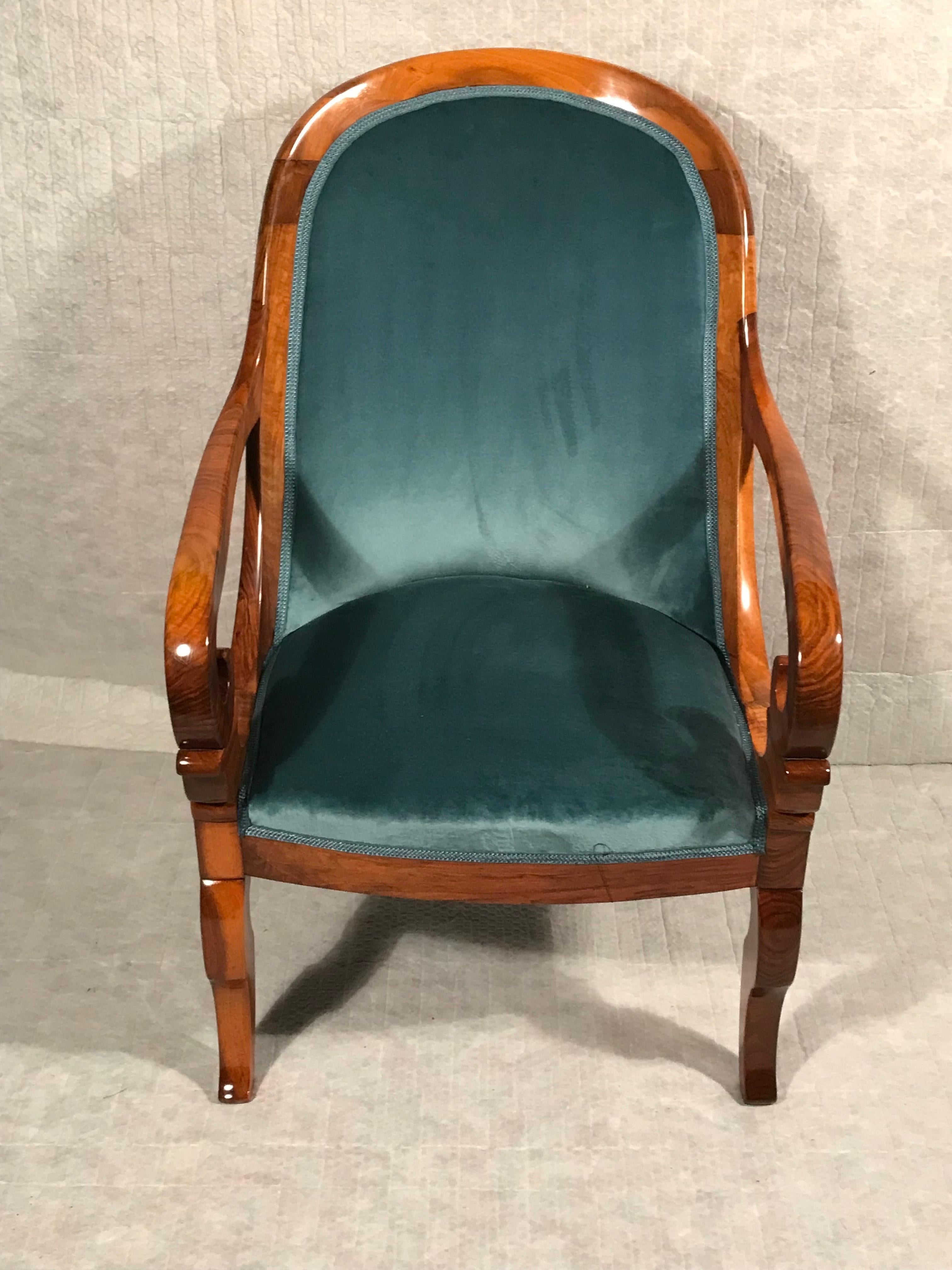 Biedermeier armchair, South West Germany, 1820. 
This very comfortable original Biedermeier armchair or bergère comes from south west Germany. It shows the influence from the French Restoration Style. 
(1814-30). The armchair has beautifully curved