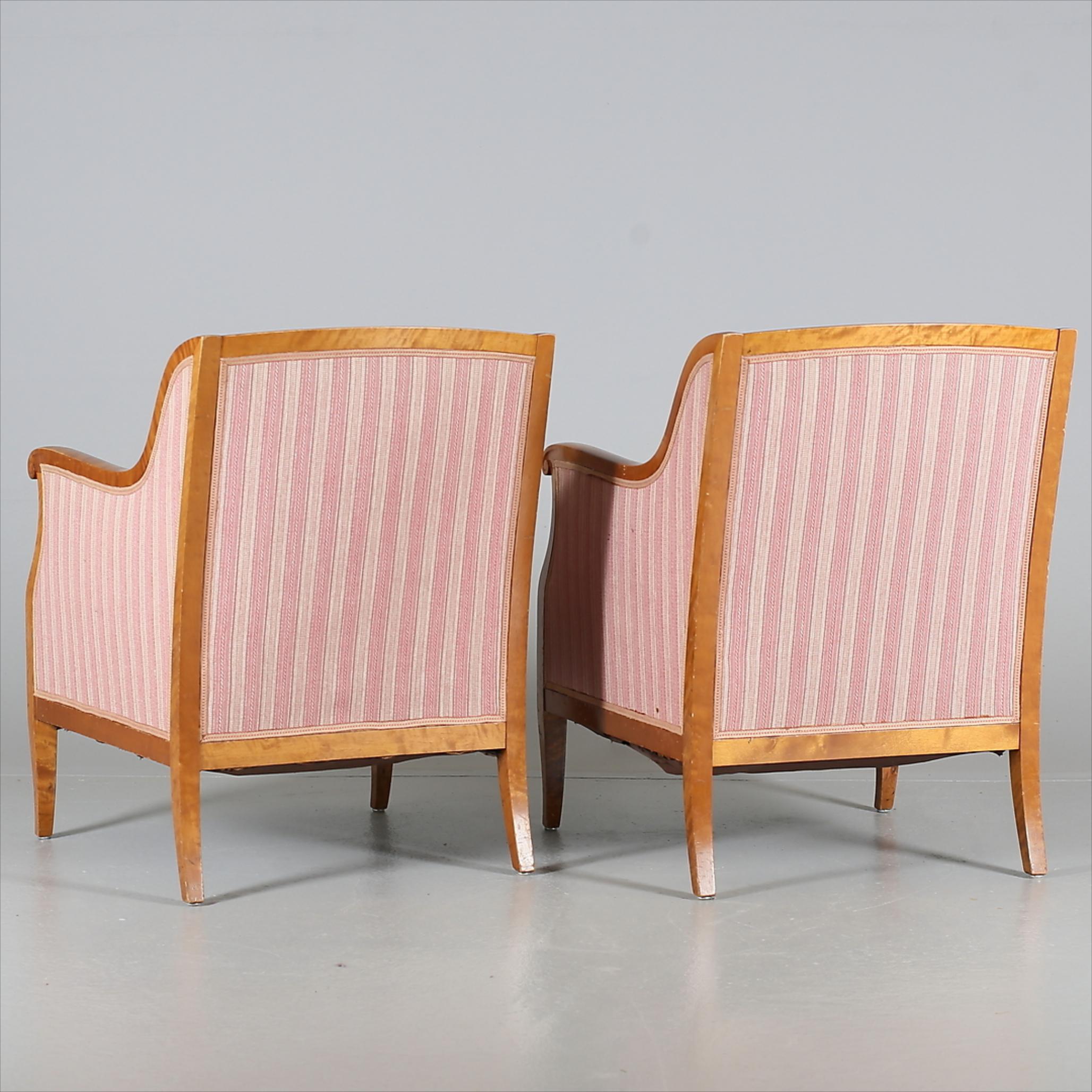 Swedish Biedermeier armchairs with golden birch bentwood arms in a rich honey color French polish finish. They have a lovely shape and are available as a pair only - probable late 1800s- early 1900s in age.

The extra deep fully sprung seats on