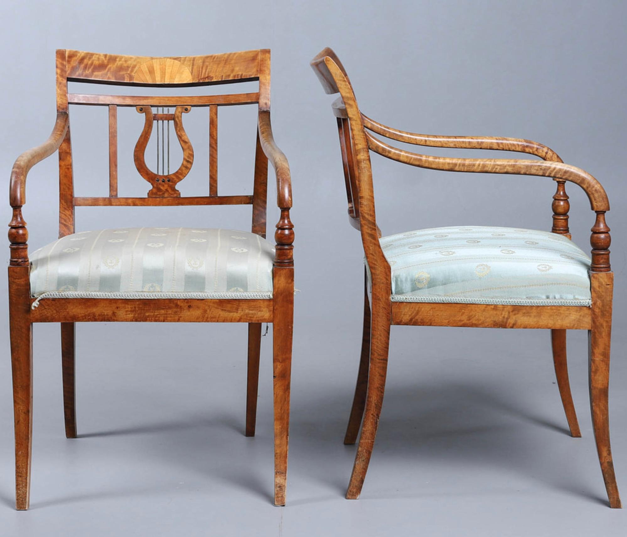 3 Swedish Biedermeier Empire antique carver chairs in highest grade quilted golden birch veneers finished in the Classic honey oak color French polish finish with rounded arms and the rarer square backs. 

The pair have a fan motif and the single