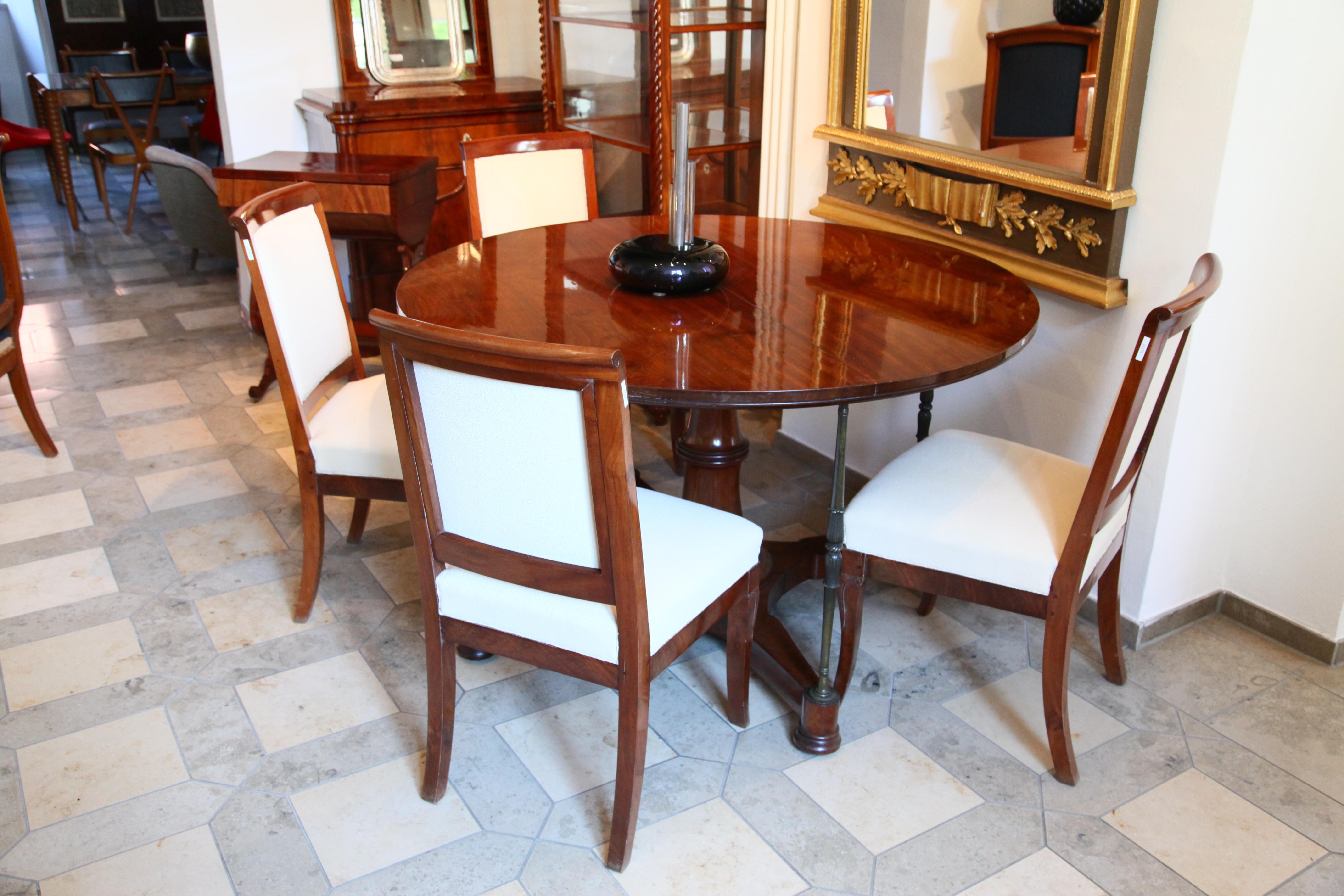 Set of six mahogany Biedermeier chairs, upholstered with a crème fabric.