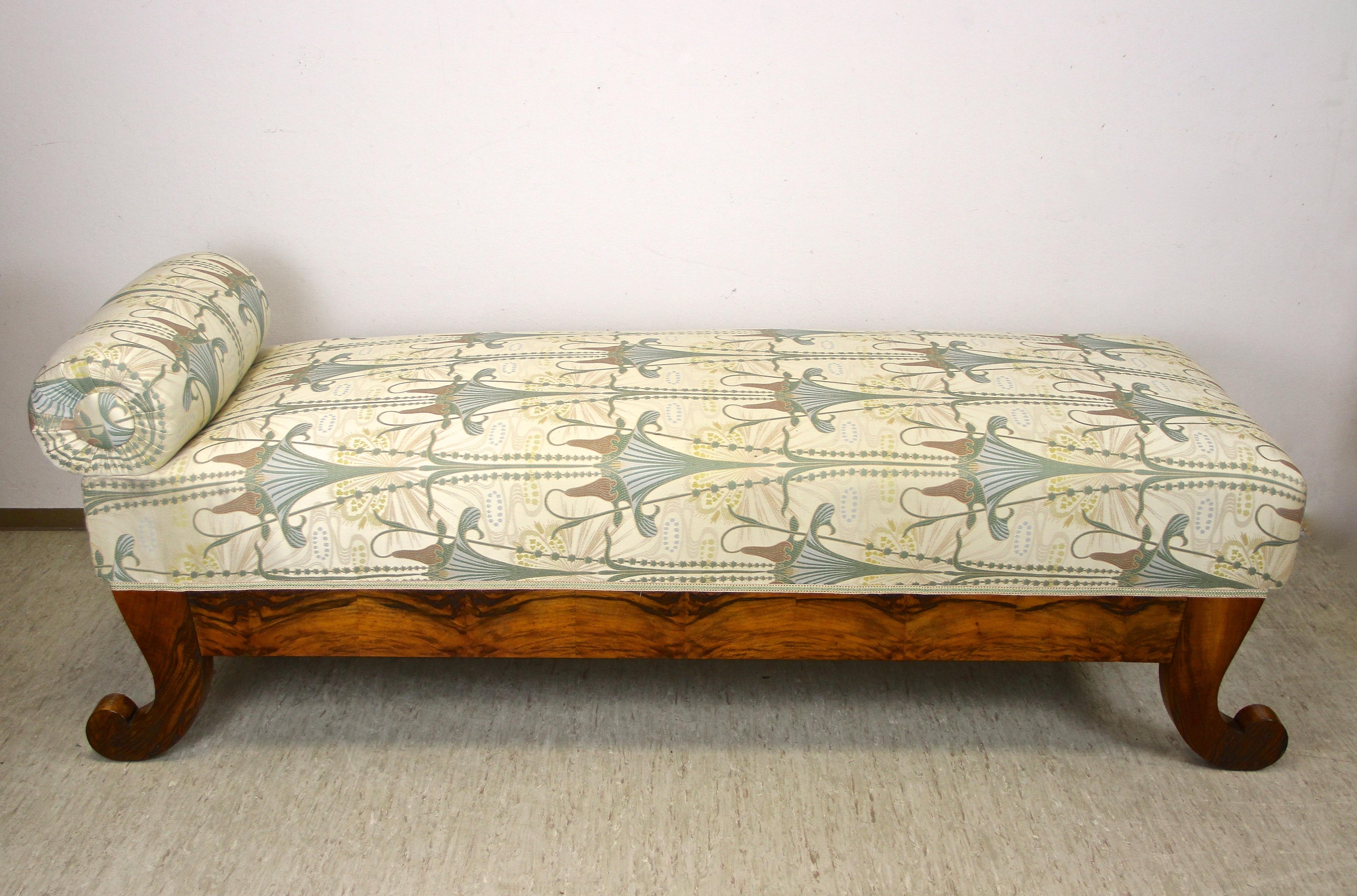 Beautiful Nutwood Biedermeier chaise lounge from the period around 1850 in Austria. This fantastic designed daybed comes with a comfortable spring core and has been newly upholstered with a marvelous floral Backhausen fabric. The substructure made