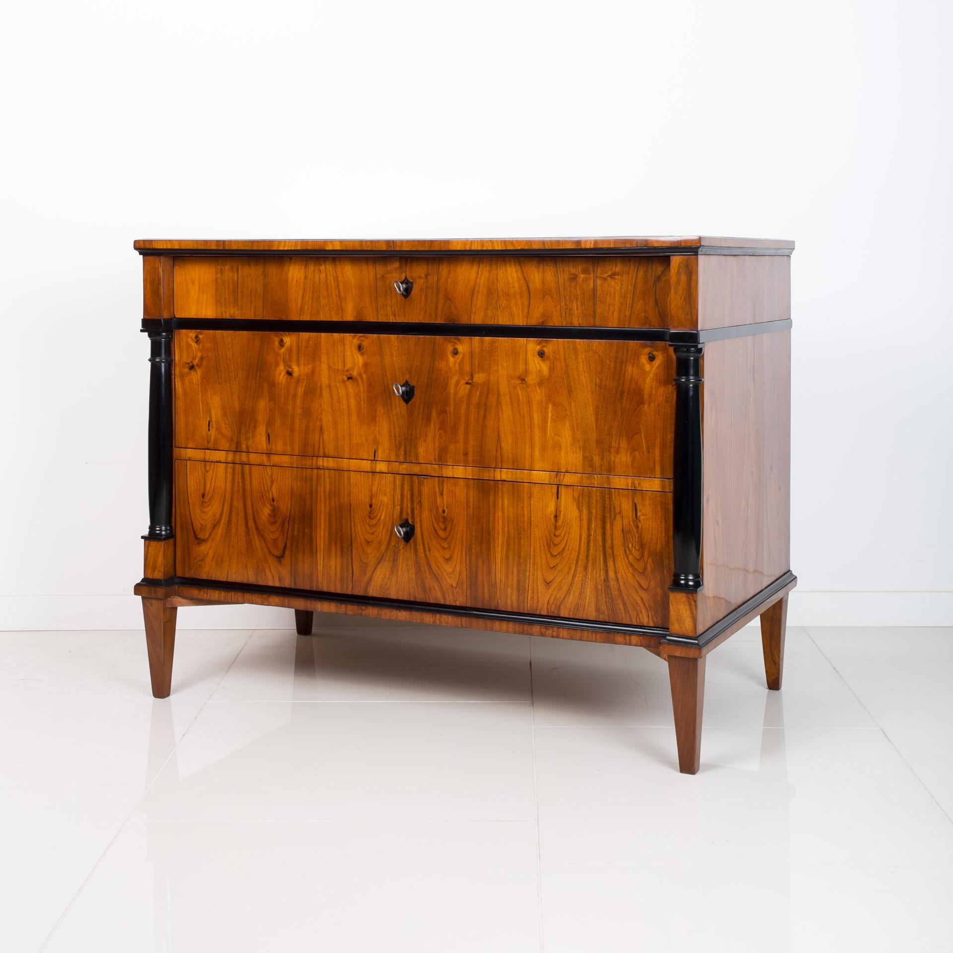 Biedermeier chest of drawers from first half of 19th century, approximately 1830 - 1850. This piece of furniture comes from Germany. It is veneered with beautiful walnut veneer. It has undergone a careful renovation process in our workshop and is in