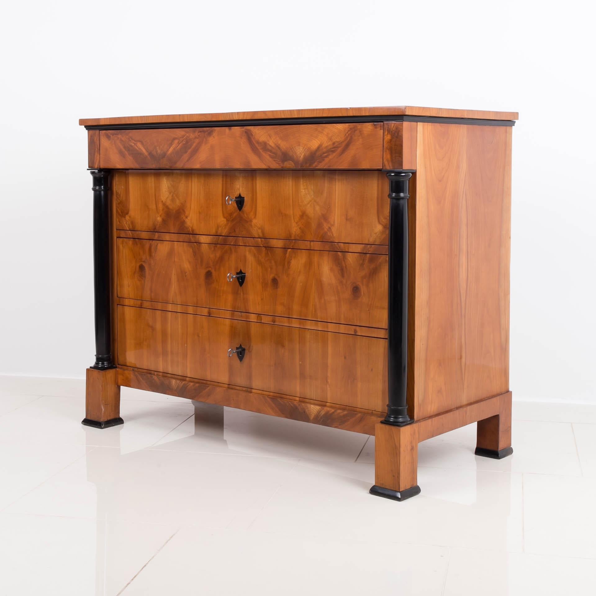 Biedermeier chest of drawers from first half of 19th century. This piece of furniture comes from Germany. It is made of coniferous wood and veneered with beautiful cherry wood veneer. It has undergone a careful renovation process in our workshop and