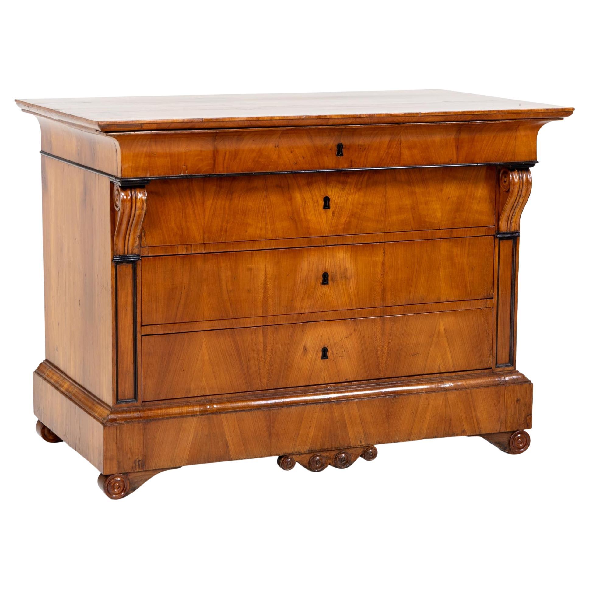 Biedermeier Chest of Drawers, polished Cherry veneer, four drawers, circa 1830 For Sale