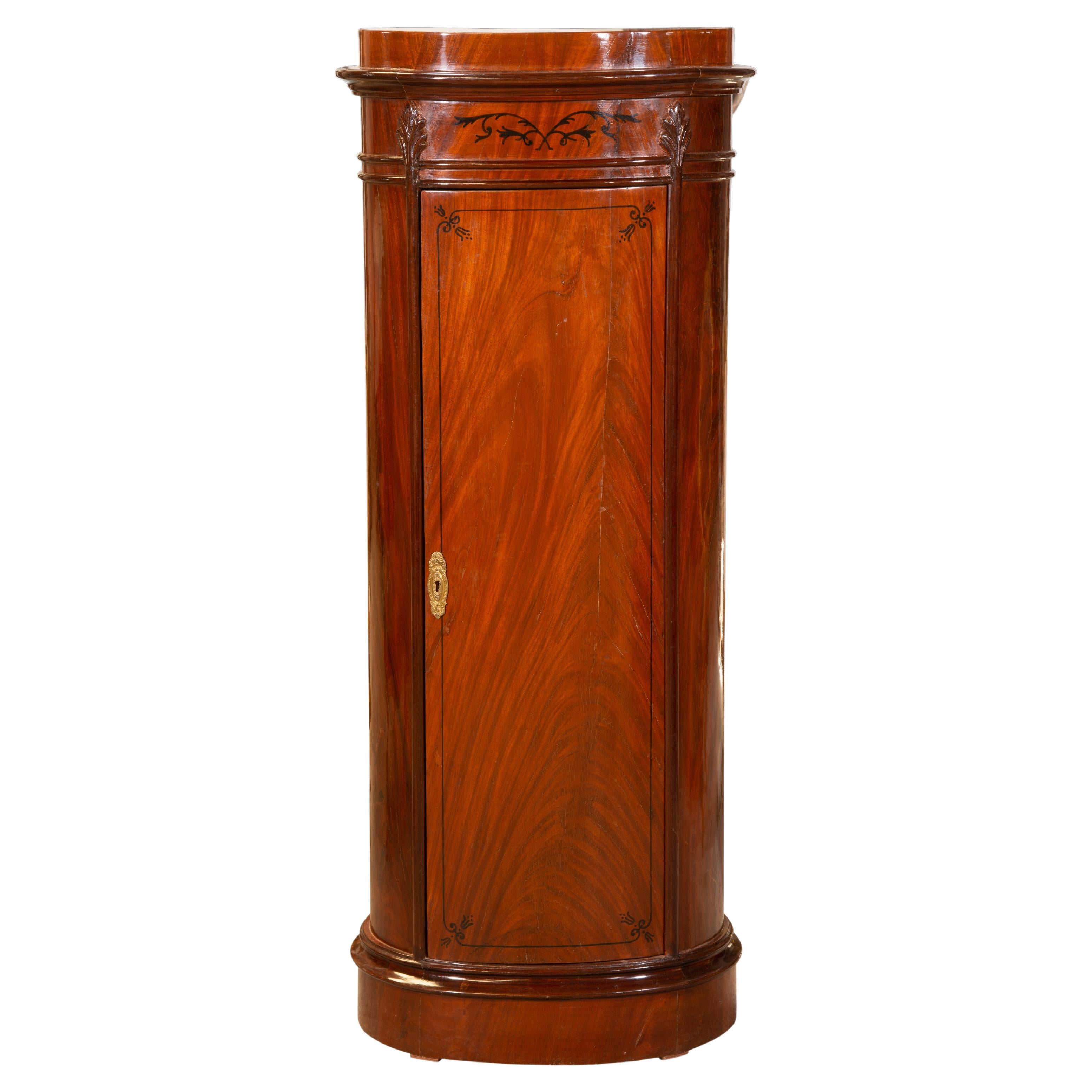 Biedermeier column or bollard type cabinet. Wood. 20th century.