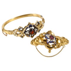 Antique Biedermeier demi-parure, gold bracelet and brooch with garnets & enamel, 1850s.