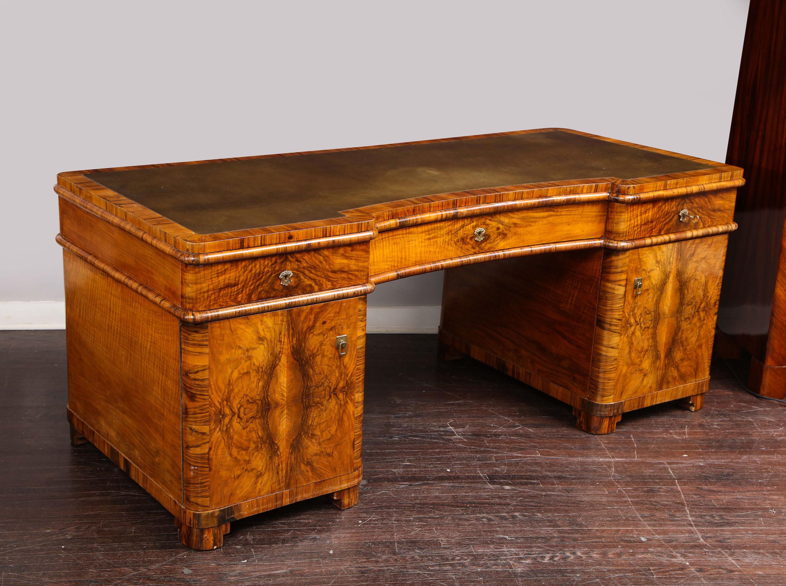 Biedermeier desk. The piece is in good condition and shows fine scratches and minor cosmetic wear. Restoration quote can be provided upon request.