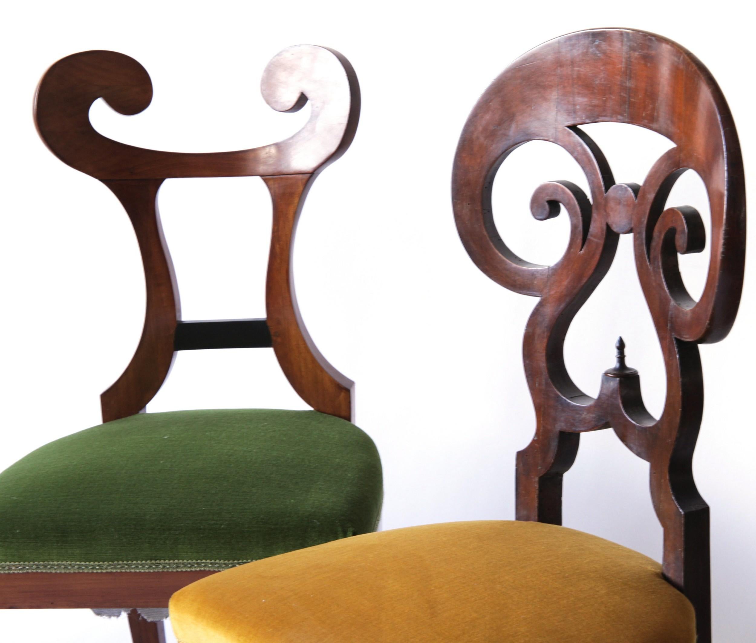 I'm proposing here an incredible Biedermeier set. Made of eight different style of chairs. 

An profusion of cherry, walnut wood, carvings and curves used at the time with the designs that made the style so popular. Carvings, curves

Just an