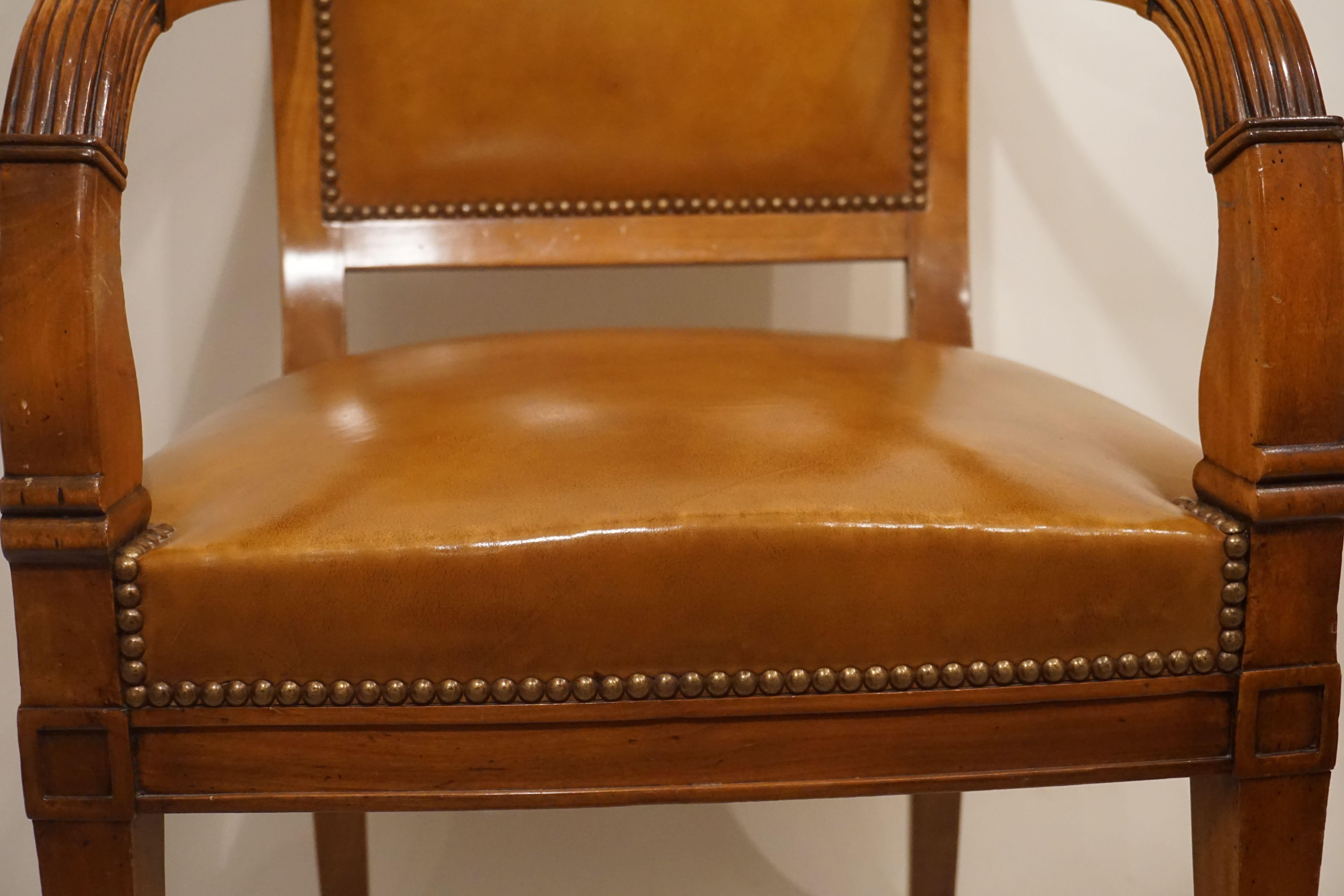 Biedermeier Louis-Philippe armchair with leather cover in very good condition.