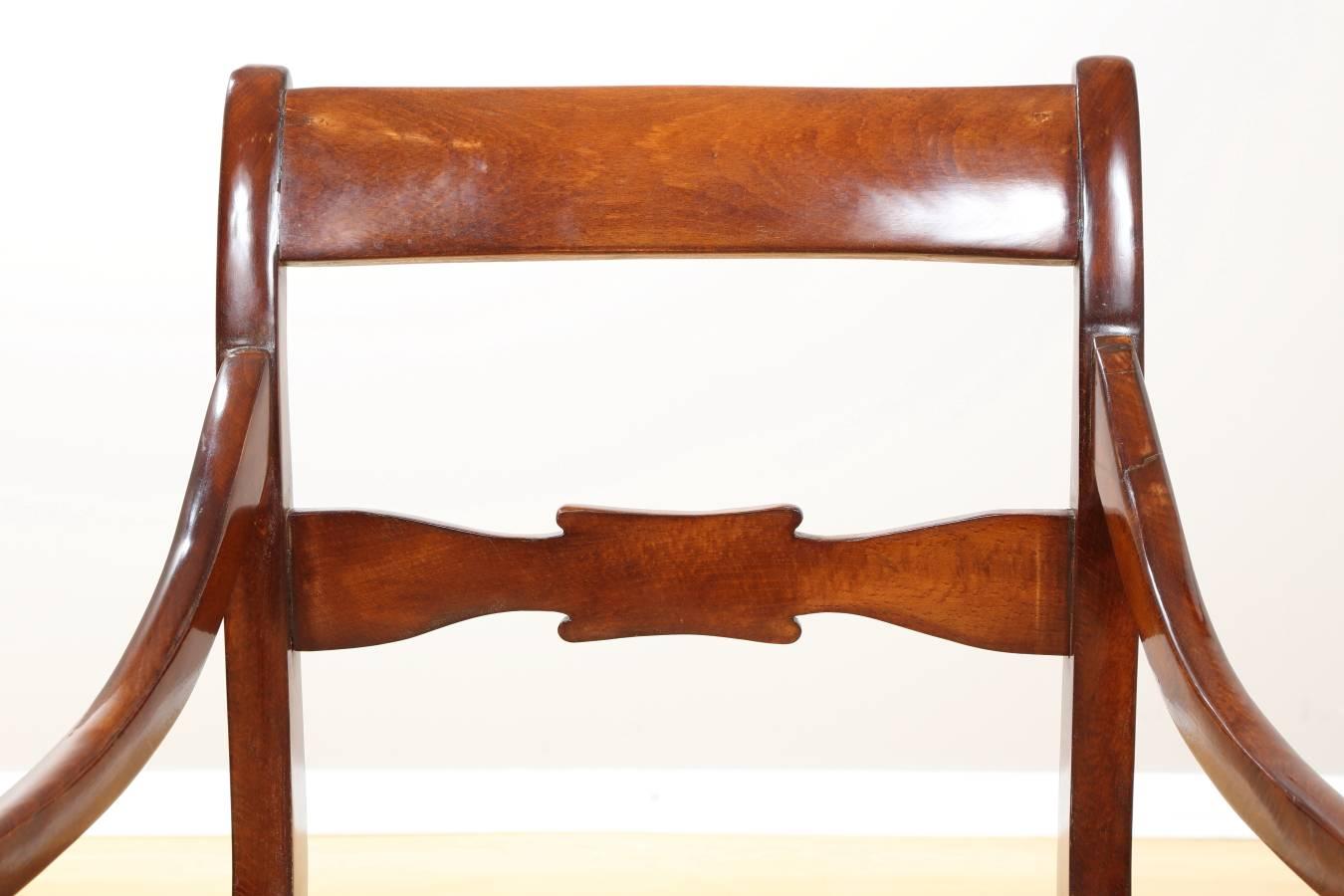 Biedermeier mahogany chair, circa 1830. Elegant chair with mahogany frame from Germany Biedermeier period. The chair has been restored, reupholstered, and hand polished with natural shellac. Measures: Seat height 19