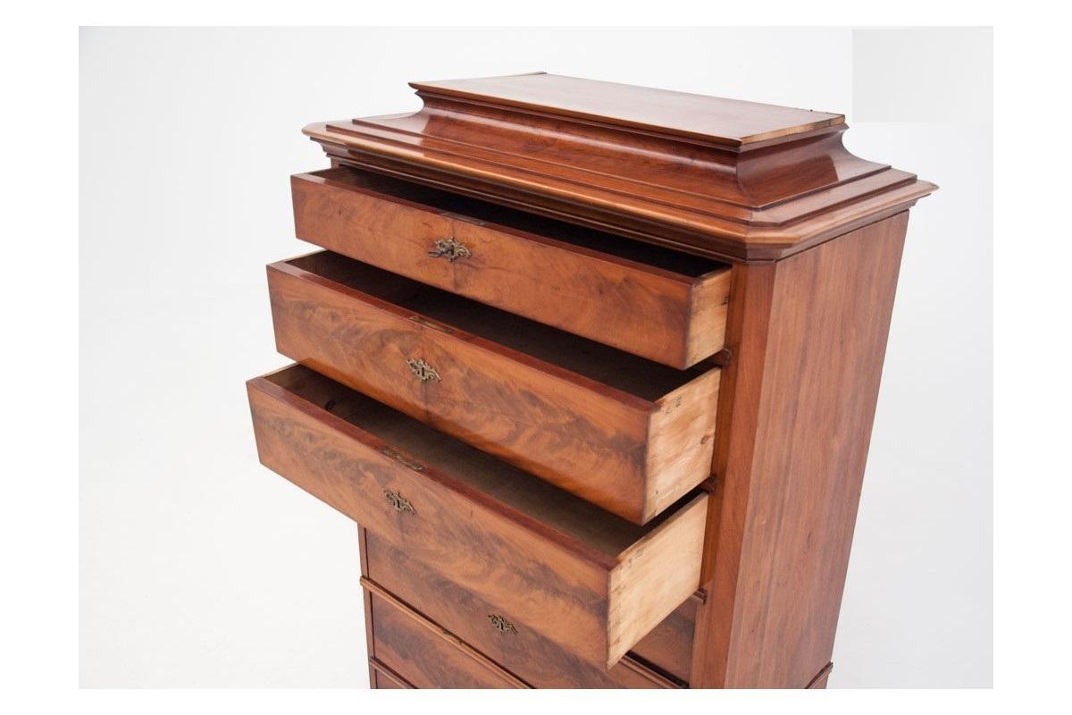 A beautiful, tall chest of drawers from the late 19th century.

Wood: mahogany,

Year: circa 1880,

Origin: Northern Europe,

Dimensions: height 165 cm, width 103 cm, depth 51 cm,

During renovation.