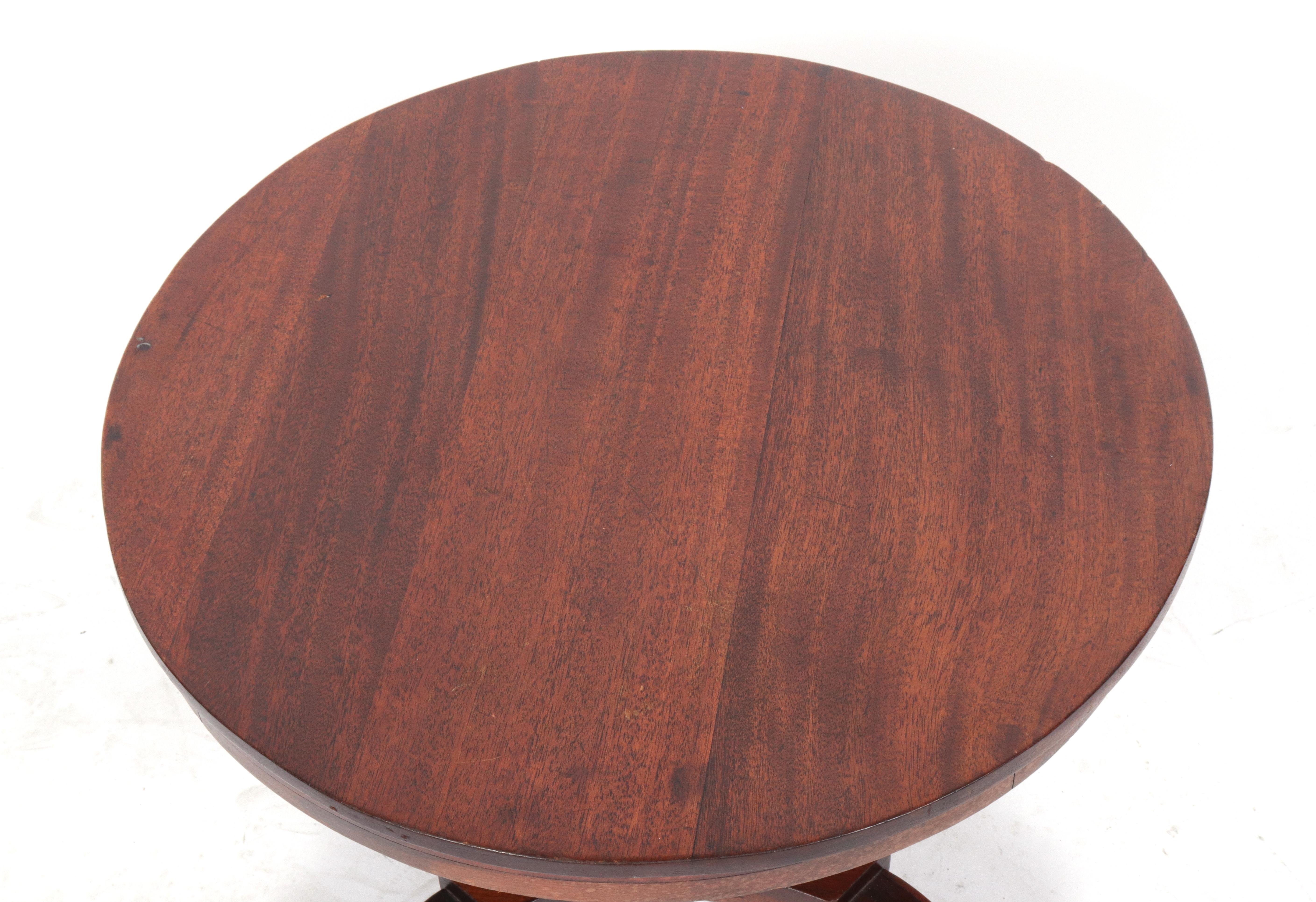 Biedermeier manner round wooden occasional table with pedestal base.