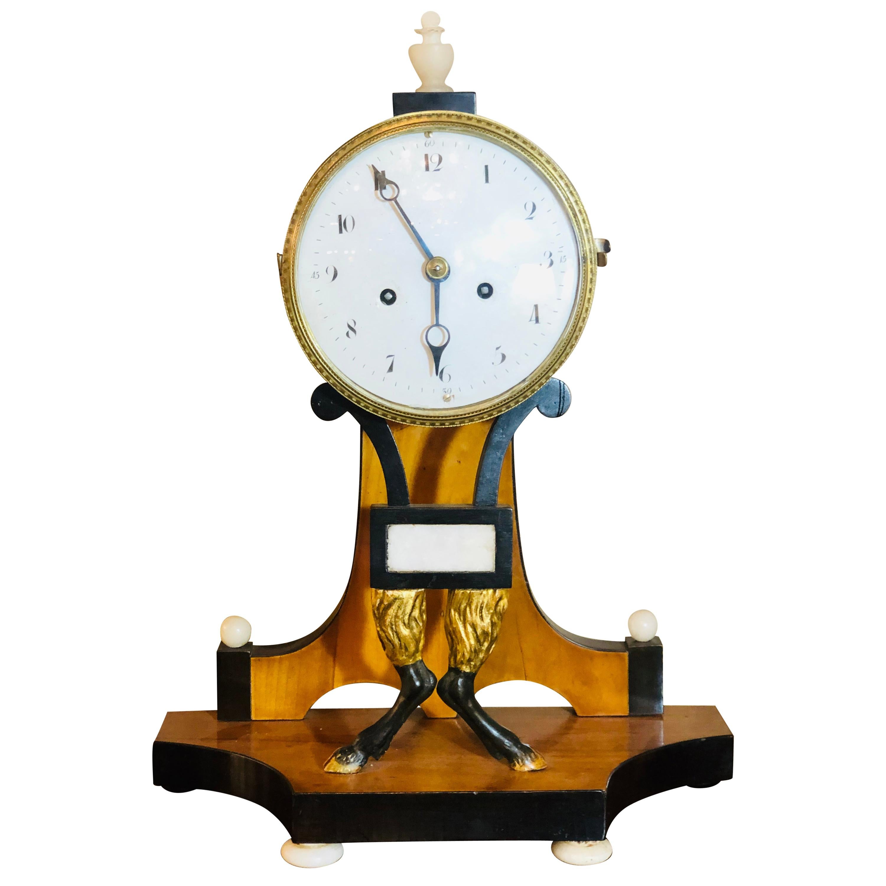 Biedermeier Mantle Clock with Ebonized Details and Hoof Legs Silk Suspension For Sale