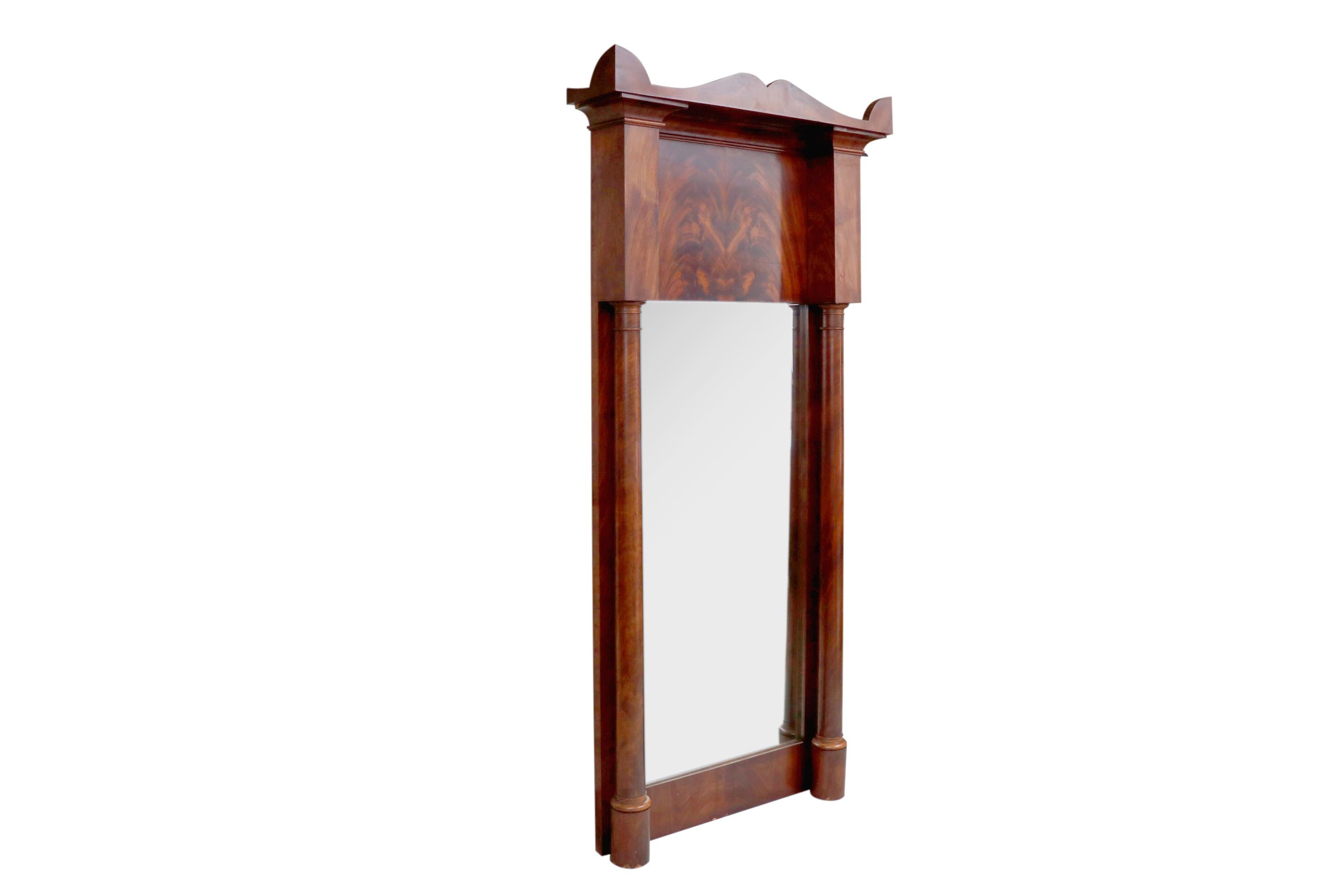 Large architectural Biedermeier mirror measures 74 inches high and 35 inches wide beautiful crotch mahogany veneer.
