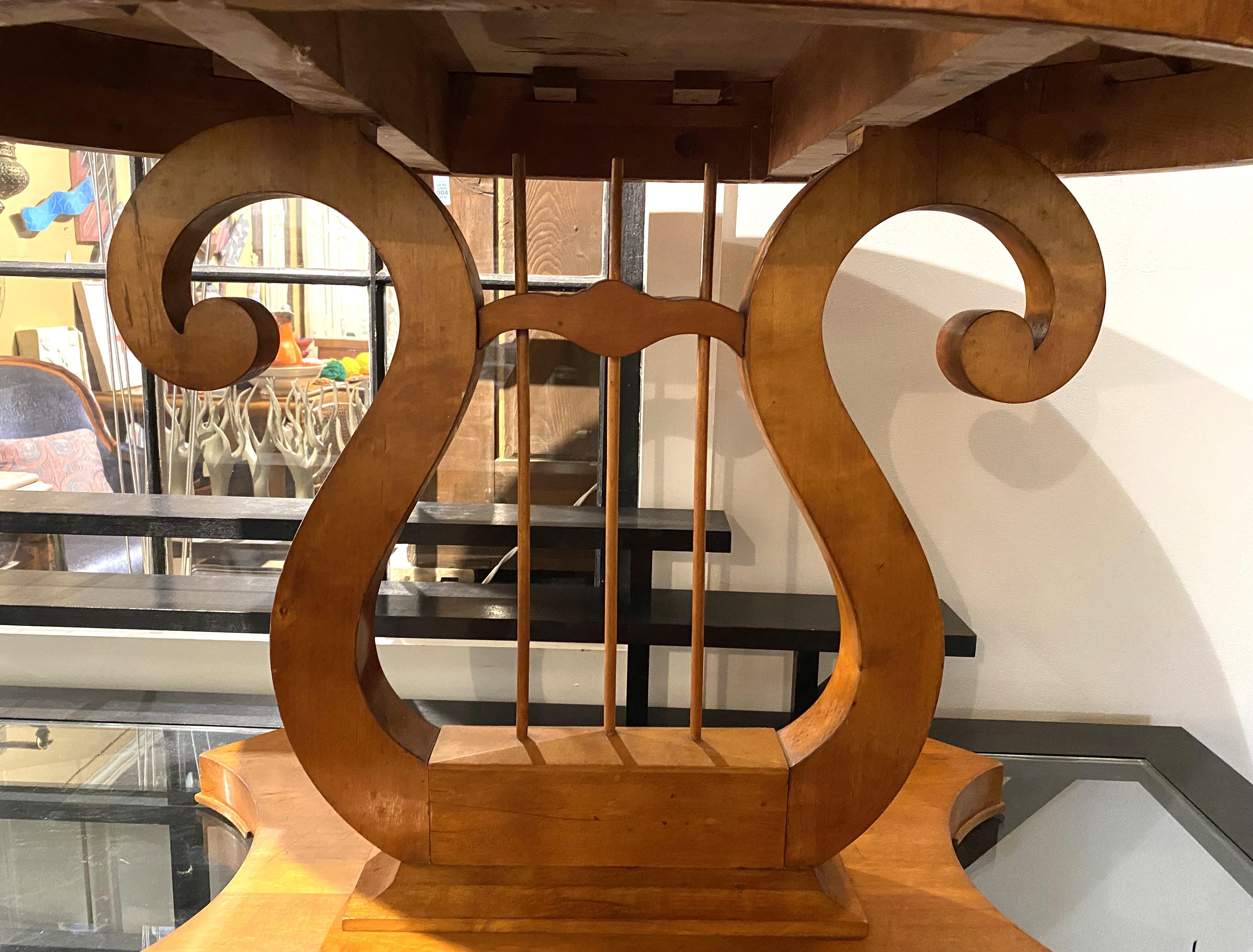 19th Century Biedermeier or Classical Style Curly Maple Oval Center Table with Lyre Form Base For Sale