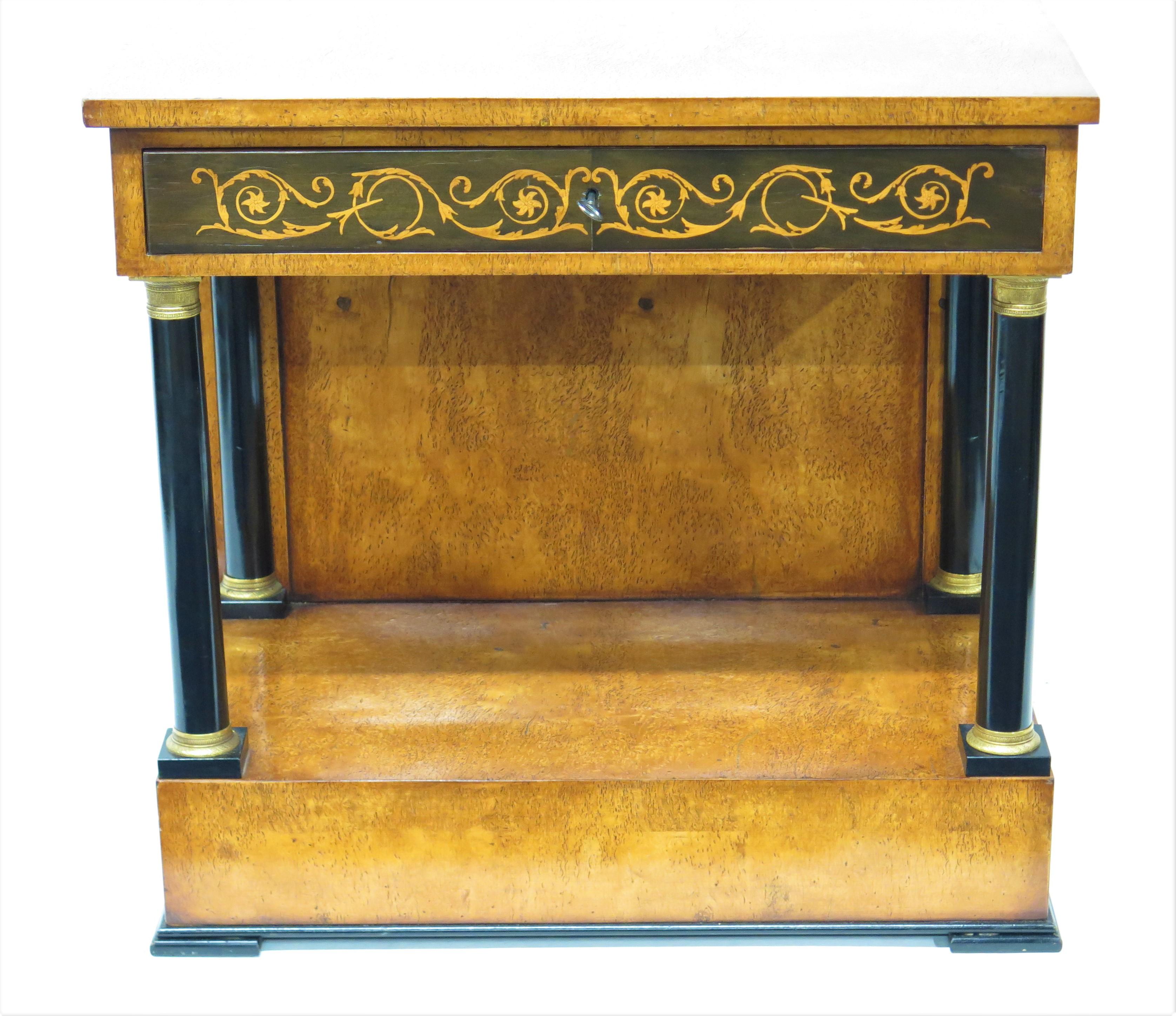 a Biedermeier pier table / console of birch and birch veneers with ebonized and gilt bronze details, single large drawer with handsome marquetry decoration, beautiful finish overall, Germany, 20th century, with key