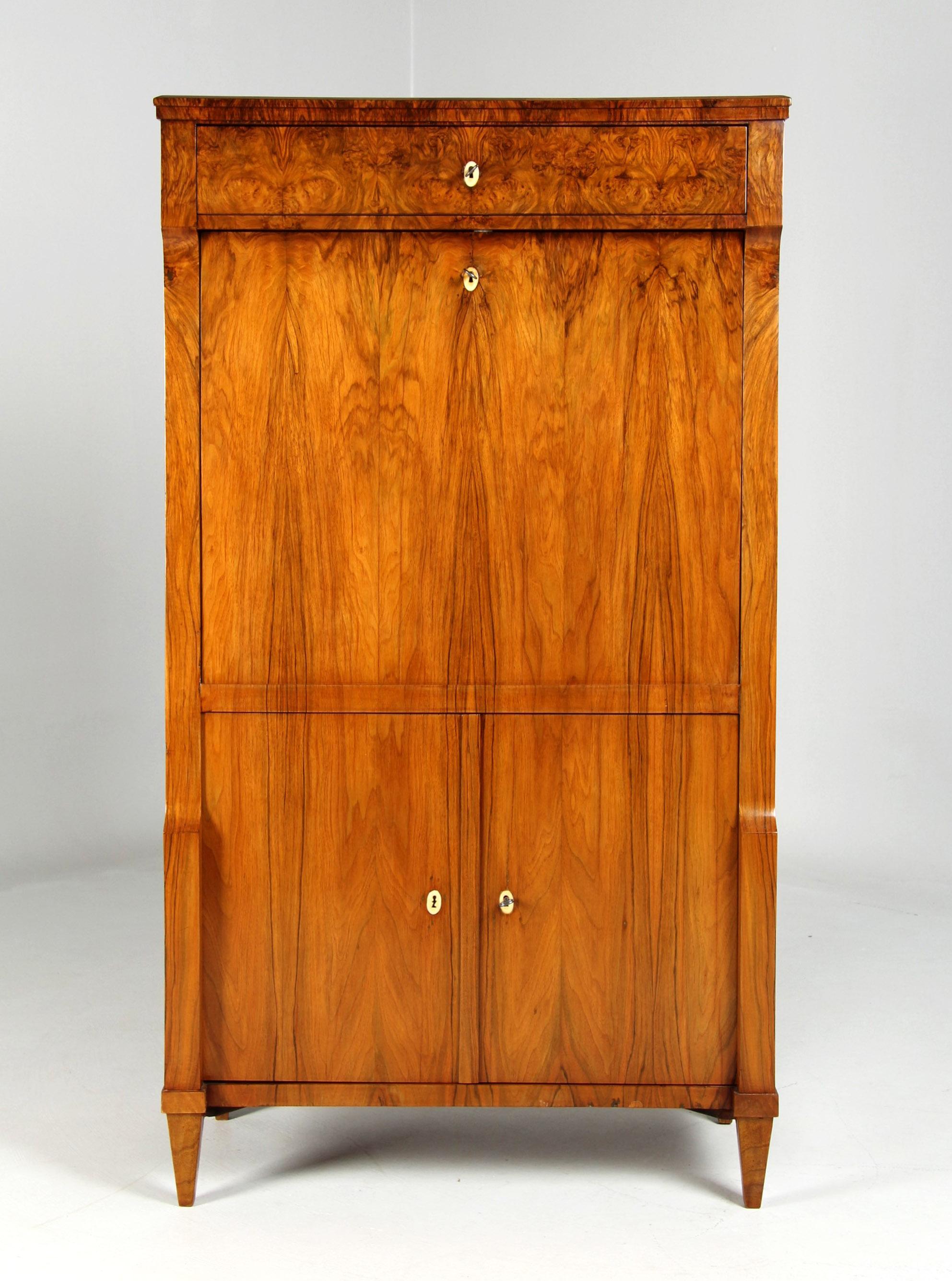 Secretary with black ink painting

Austria
Walnut
Biedermeier circa 1820

Dimensions: H x W x D: 155 x 85 x 46 cm

Description:
Exceptionally narrow writing desk with a highly interesting interior and a fantastic walnut grain pattern.

The body