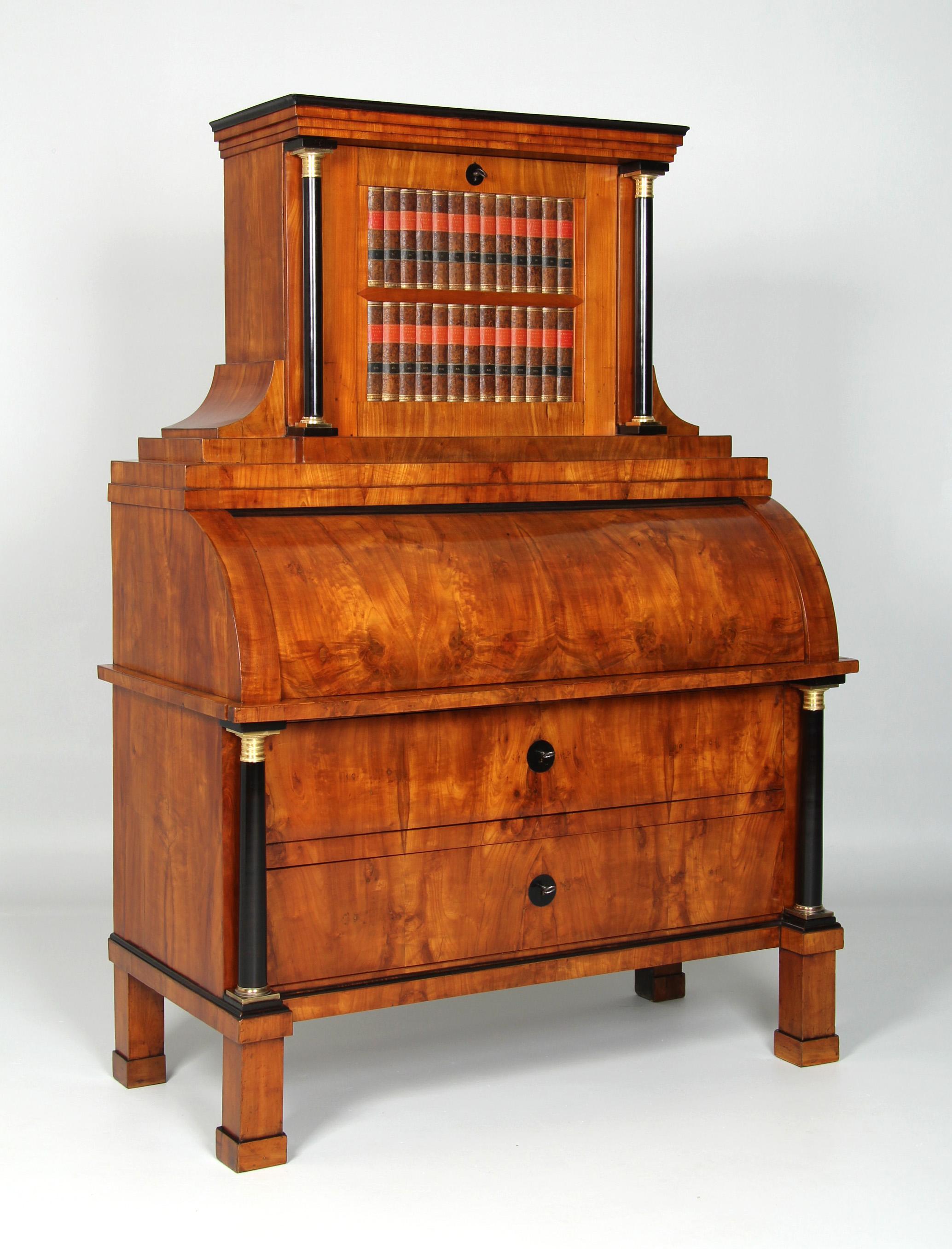 Antique Biedermeier secretary with rare mechanism

Middle German
Cherry
Biedermeier circa 1815

Dimensions: H x W x D: 180 x 128 x 63 cm

Description:
Antique cylinder secretary in masterly quality with extraordinary mechanism and numerous secret