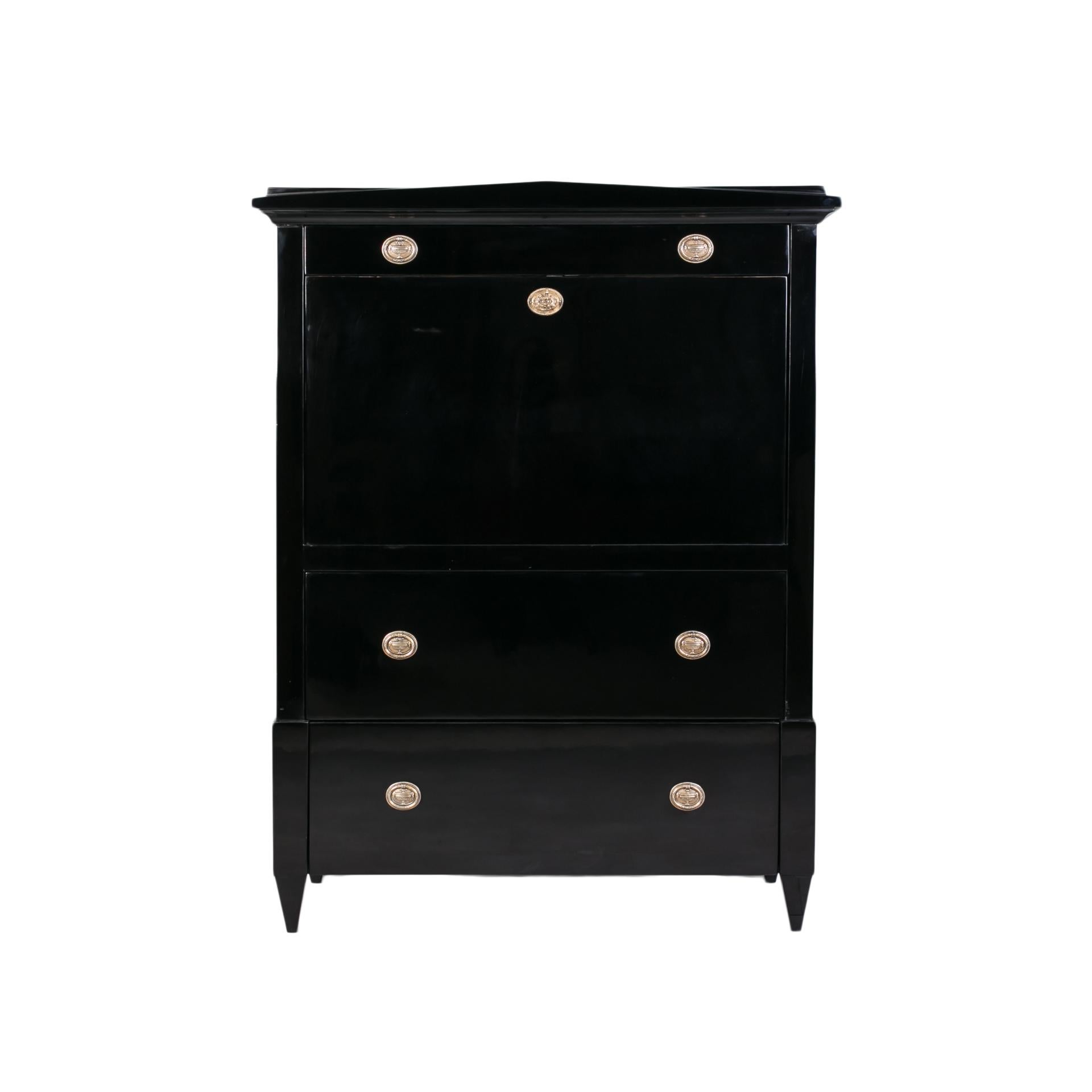 This Biedermeier secretary comes from Austria and was made in 19th century. It is made of coniferous wood, veneered with maple wood. It has undergone a professional renovation process. Surface finished with black shellac polish applied by hand with