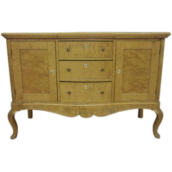 Biedermeier sideboard, credenza or liquor cabinet with plenty of storage space. Has many compartments for bottles. Lovely carvings and handcut dovetails to the front and back of the drawers. The top of the piece rests on top of the base.