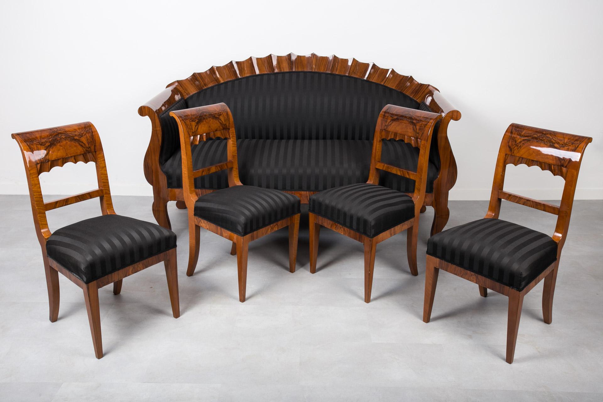 This marvelous Biedermeier sofa set comes from Germany and was made in the 19th century. All pieces are after complete renovation. Wooden elements have been cleaned and refinished with traditional shellac polish, applied by hand which apart from