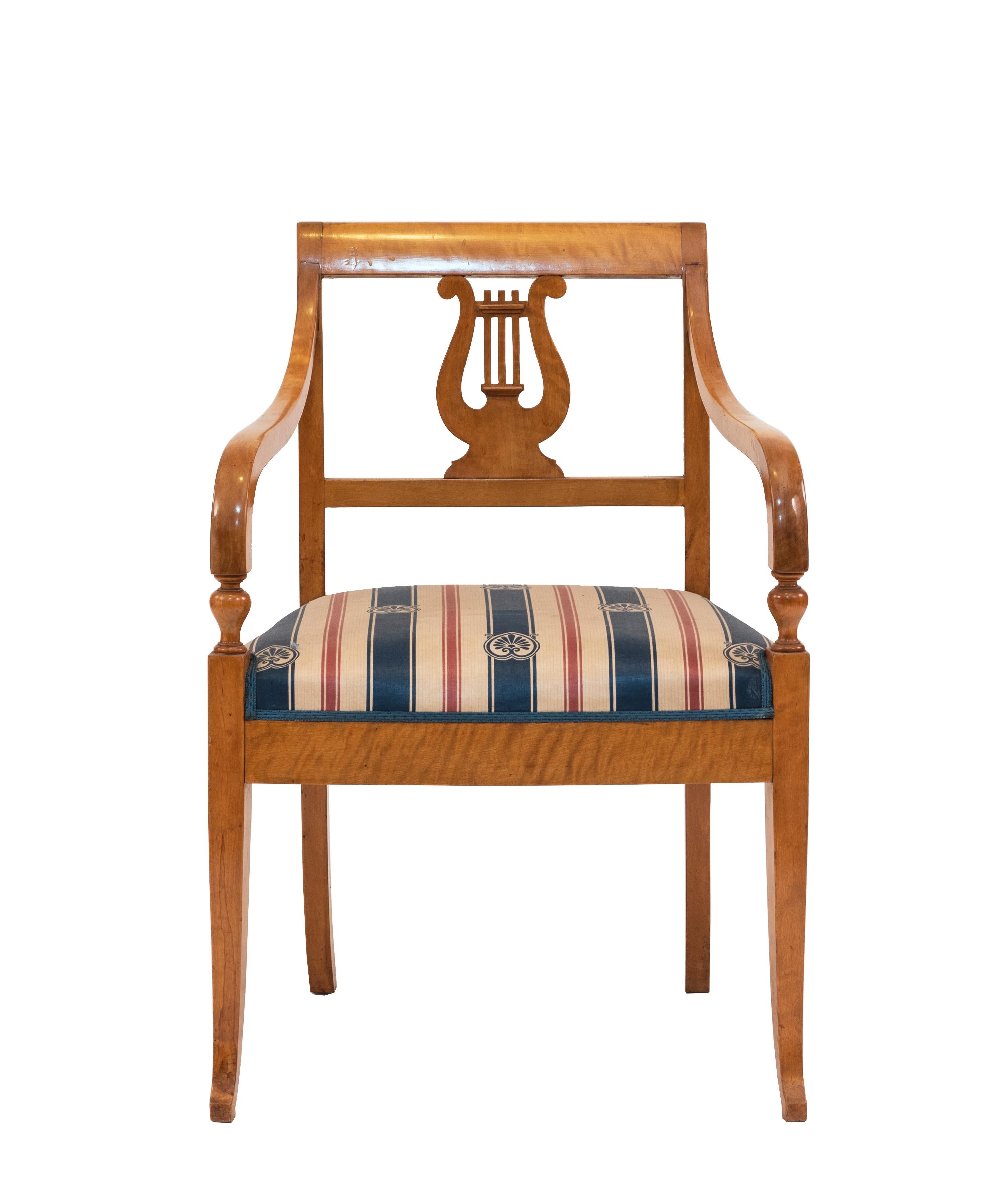 Swedish Biedermeier style (19/20th Cent) birch arm chair with lyre carved back and blue and red stripe upholstery
