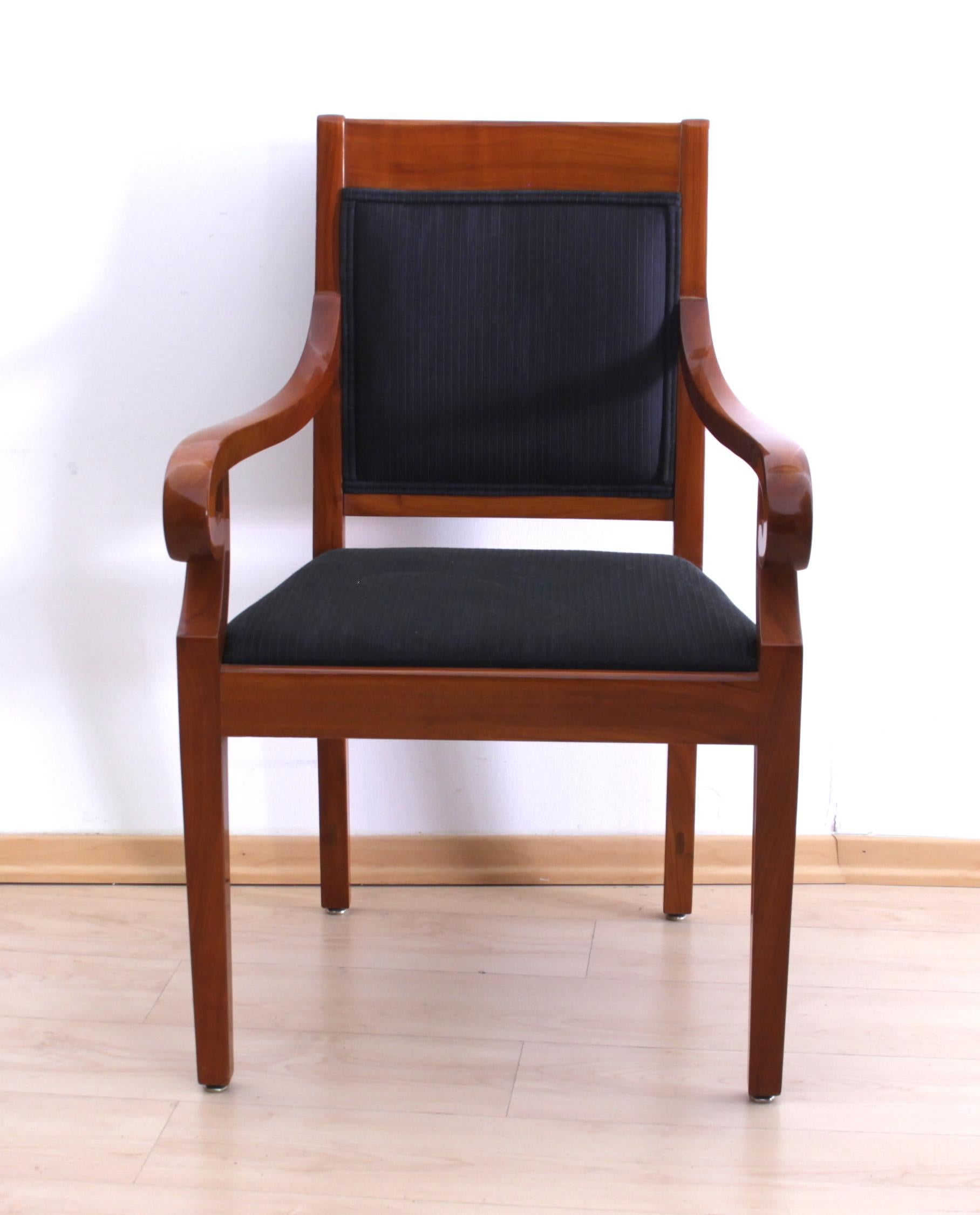 Beautiful and very comfortable Biedermeier Style armchair from South Germany, circa 1900.

Cherry solid wood hand polished with shellac (French Polish).
Newly upholstered with black striped fabric and black double keder.
Great quality and