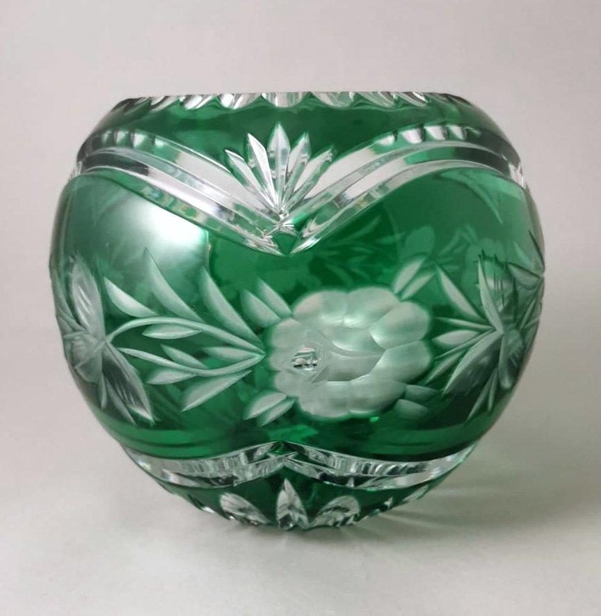 We kindly suggest that you read the entire description, as with it we try to give you detailed technical and historical information to ensure the authenticity of our objects.
Original and graceful sphere-shaped vase made of green Bohemian crystal;
