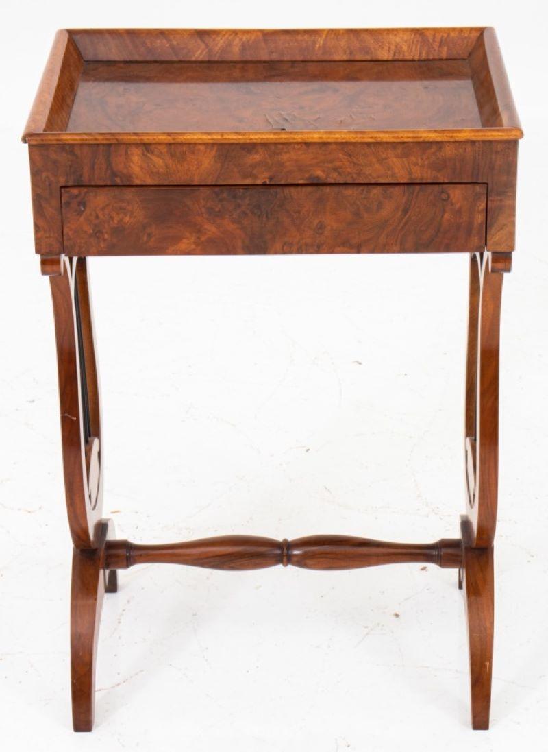 Biedermeier style burl walnut work table, with rectangular top above one drawer on lyre supports (one ebonized 