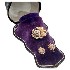 Biedermeier style demi-parure, gold enamel brooch and earrings, 1840-1850s.