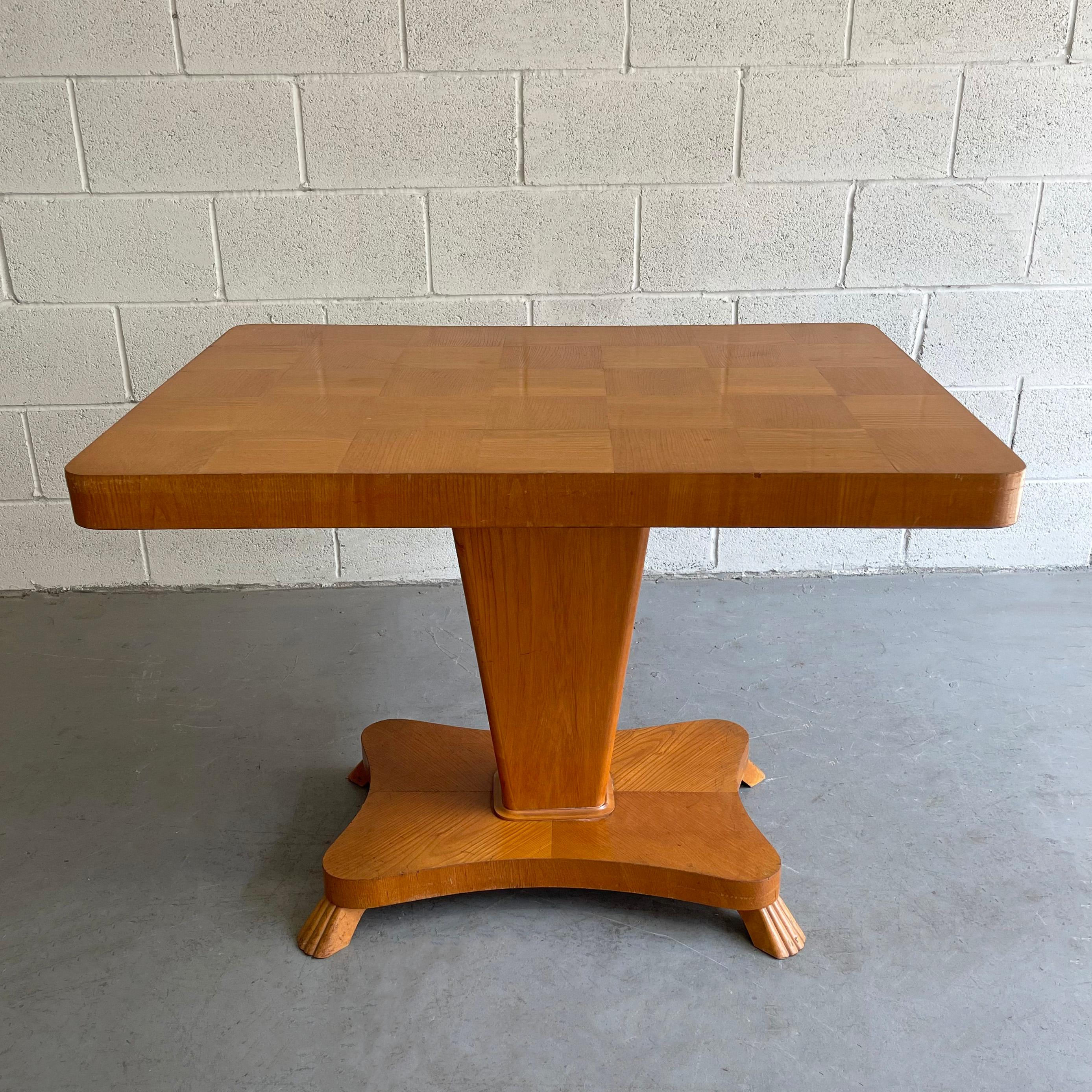 Midcentury, Biedermeier style, satinwood game table features a nicely detailed pedestal base and checkerboard parquet top with swivel height adjustment from 24- 27.50 inches.