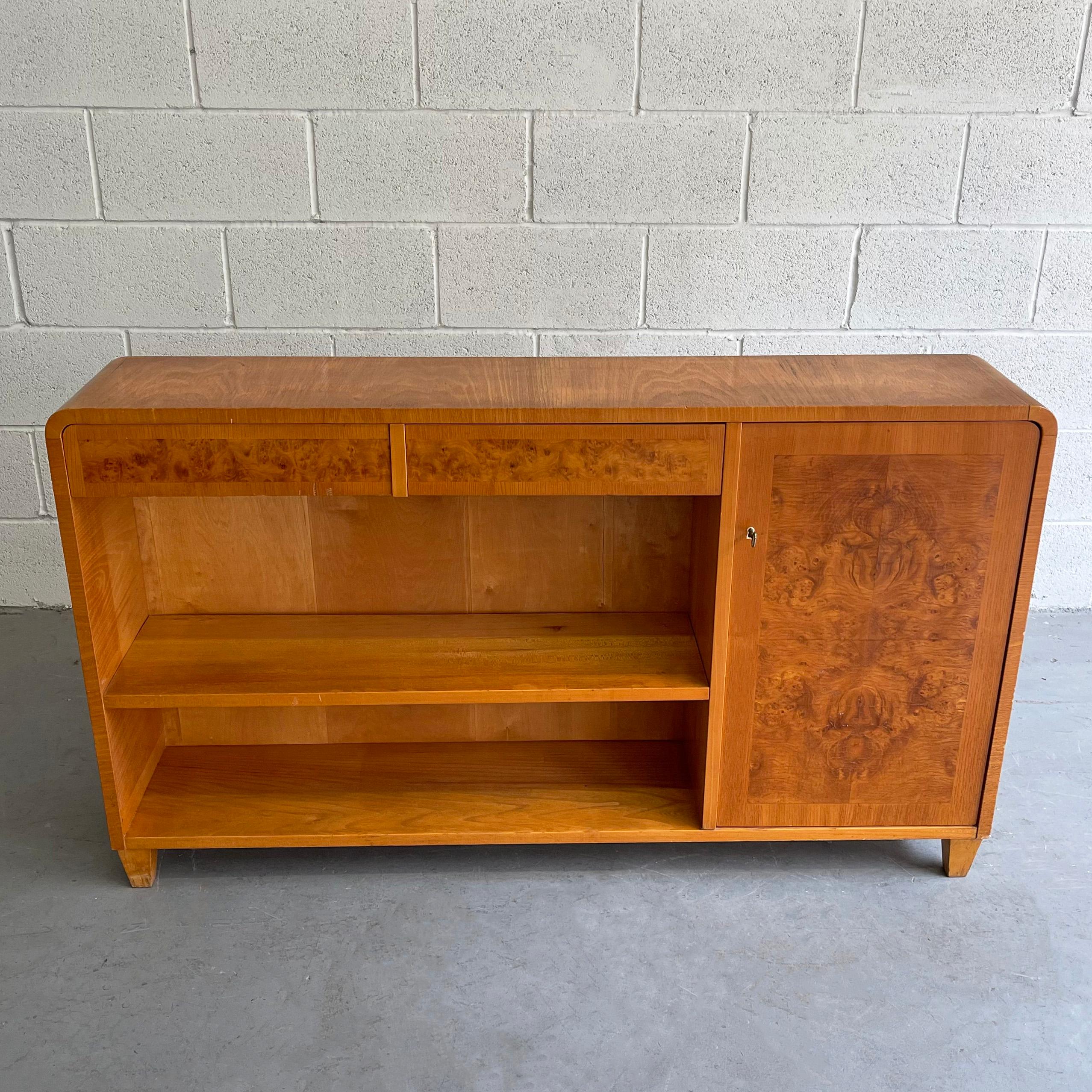 Biedermeier style, satinwood, bookcase cabinet or credenza features shelves, drawers and lockable side cabinet. This piece is nicely shallow at 10 inches depth but wide enough to offer great storage.