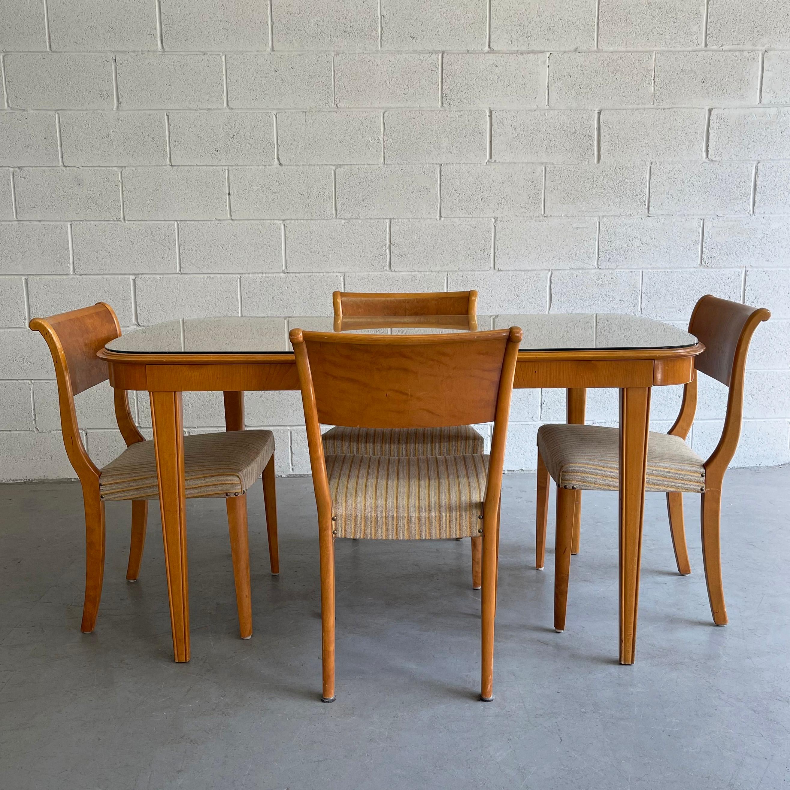 Midcentury, Biedermeier style, stainwood dining set includes a dining table with contrasting grain with removeable glass top that extends from 56 - 79 inches with 4 matching chairs that measure 18 x 18 x 31.5 inches, 16.5 inches seat ht. The set is