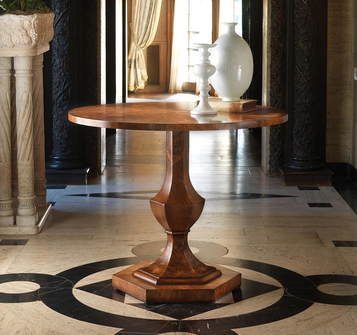 Biedermeier Walnut Table with a warm amber brown walnut finish, the rayed and figured top above a single central hexagonal baluster pedestal base.

Dimensions: 36