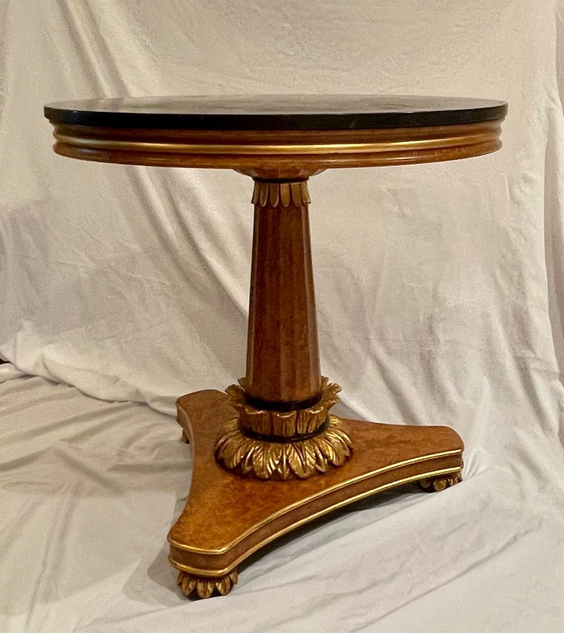 Biedermeier table carved Giltwood Marquina marble top. Invitinghome.

Luxury Biedermeier style round wood table with carved leaf motif. The table has hand painted faux burl finish and antique gold leaf trim. The round table has a black Marquina
