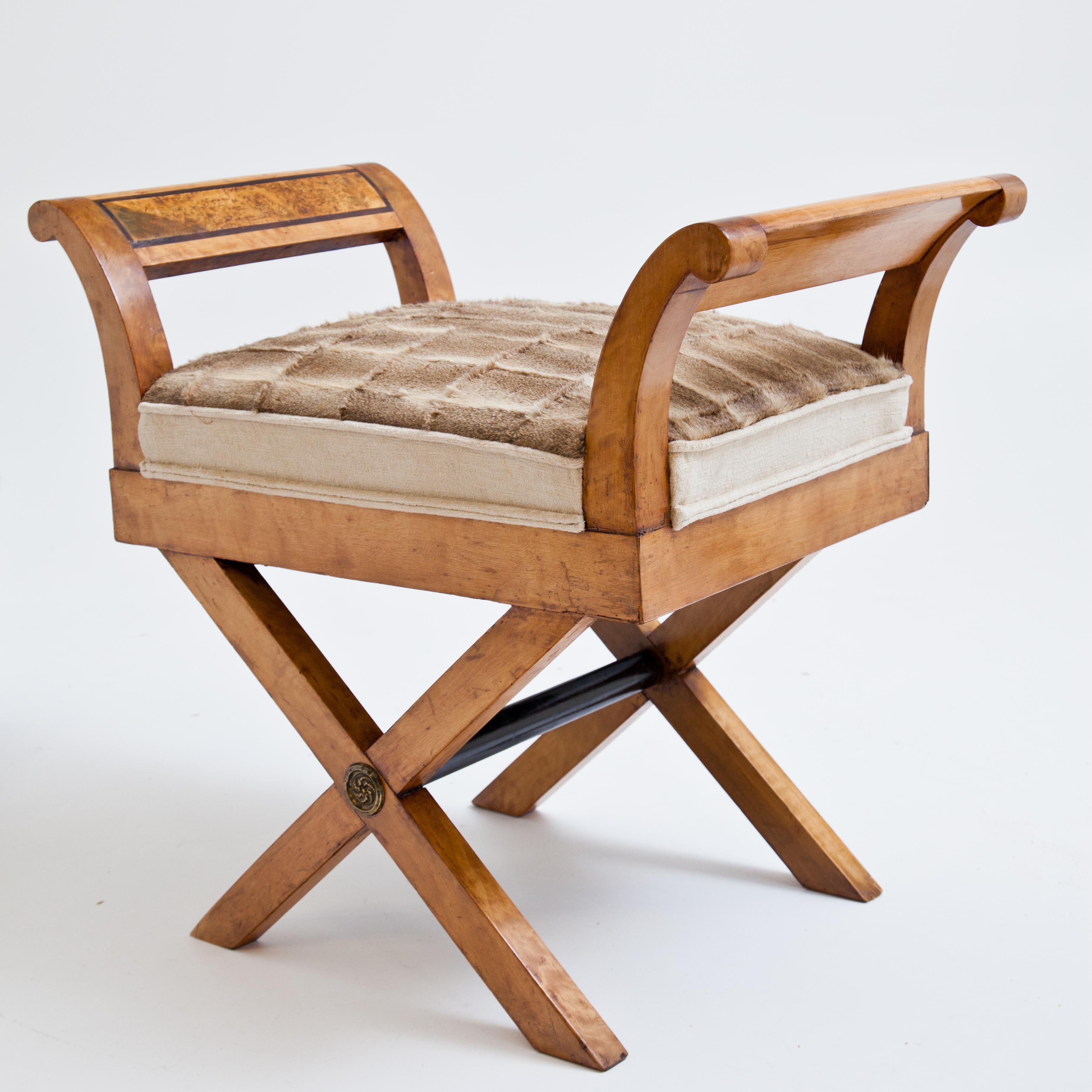 Biedermeier tabouret in the style of scissor chairs on X-shaped legs and outwardly curved armrests with rectangular burl wood inlays. Solid birch. The seat was newly covered with deer skin.