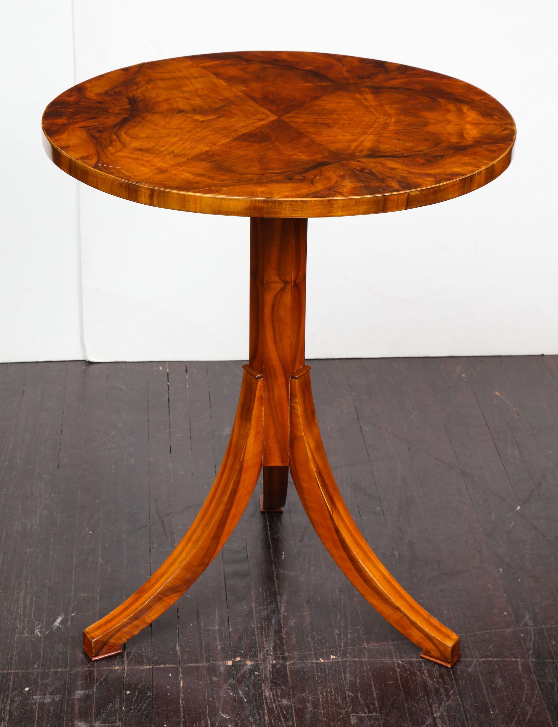 Biedermeier tripod table. The table is in good condition and shows some fine scratches and cosmetic wear. Restoration quote can be provided upon request.