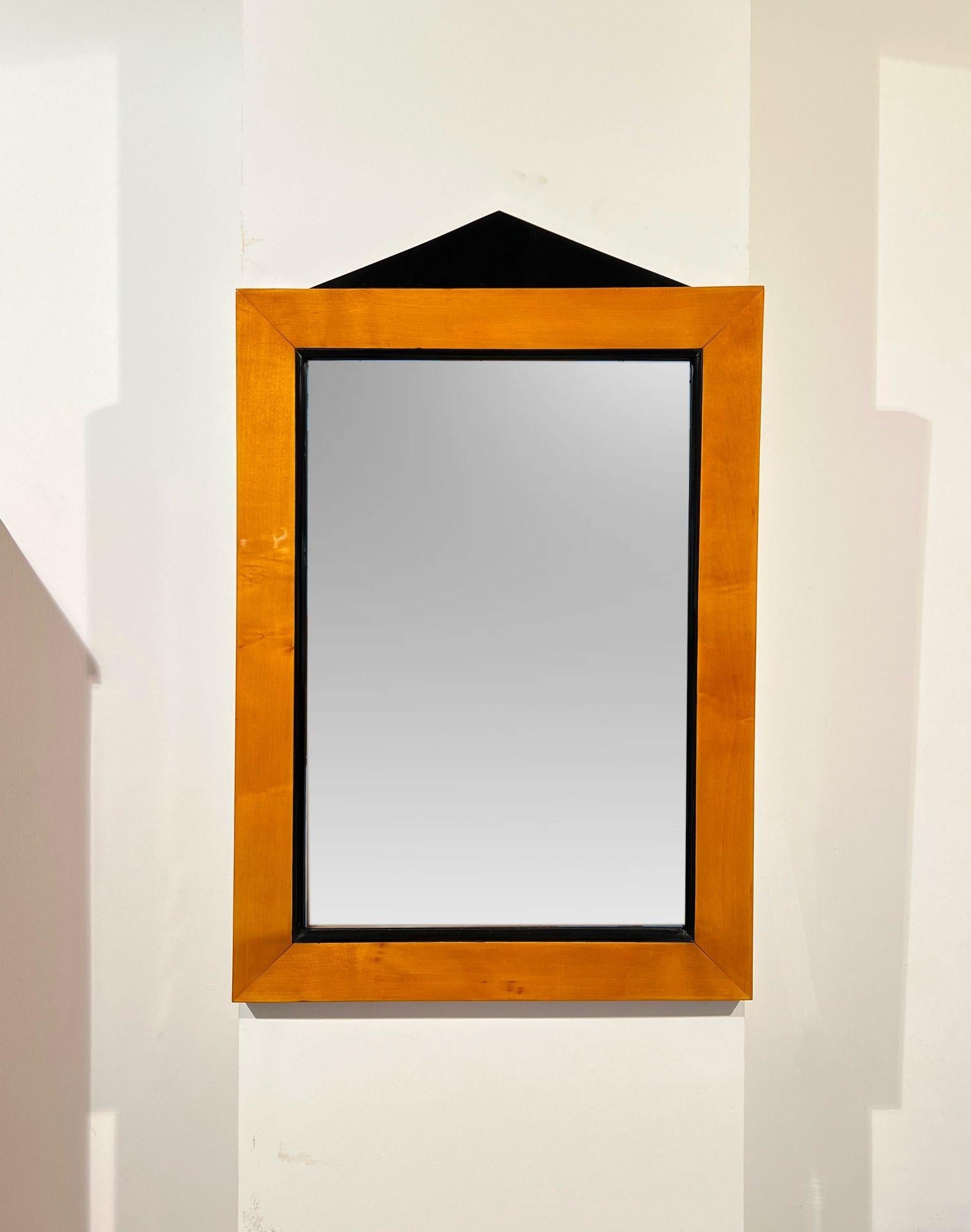 Rectangular Biedermeier wall mirror from South Germany circa 1820.
Solid maple wood with an ebonized classicist cornice.
Restored and hand-polished with shellac. Old mirror glass
Dimensions:
* H 82 cm / 32.3 in
* W 64 cm / 25.2 in
* D 3 cm / 1.18 in