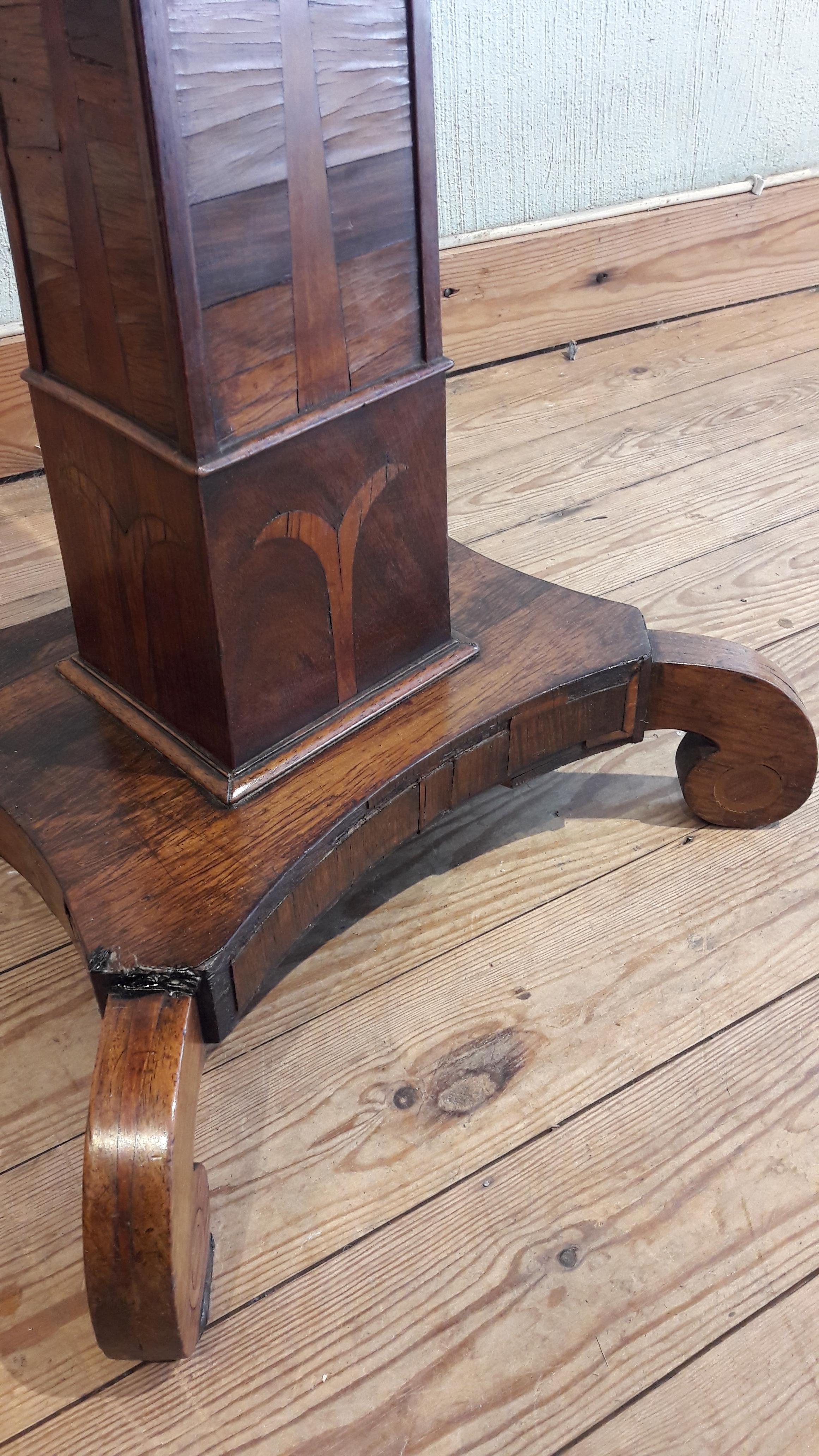 Magnificent Biedermeier walnut and satinwood chess table with one small drawer. This table has elegant feet and the wooden chess pieces are included but they are not original.