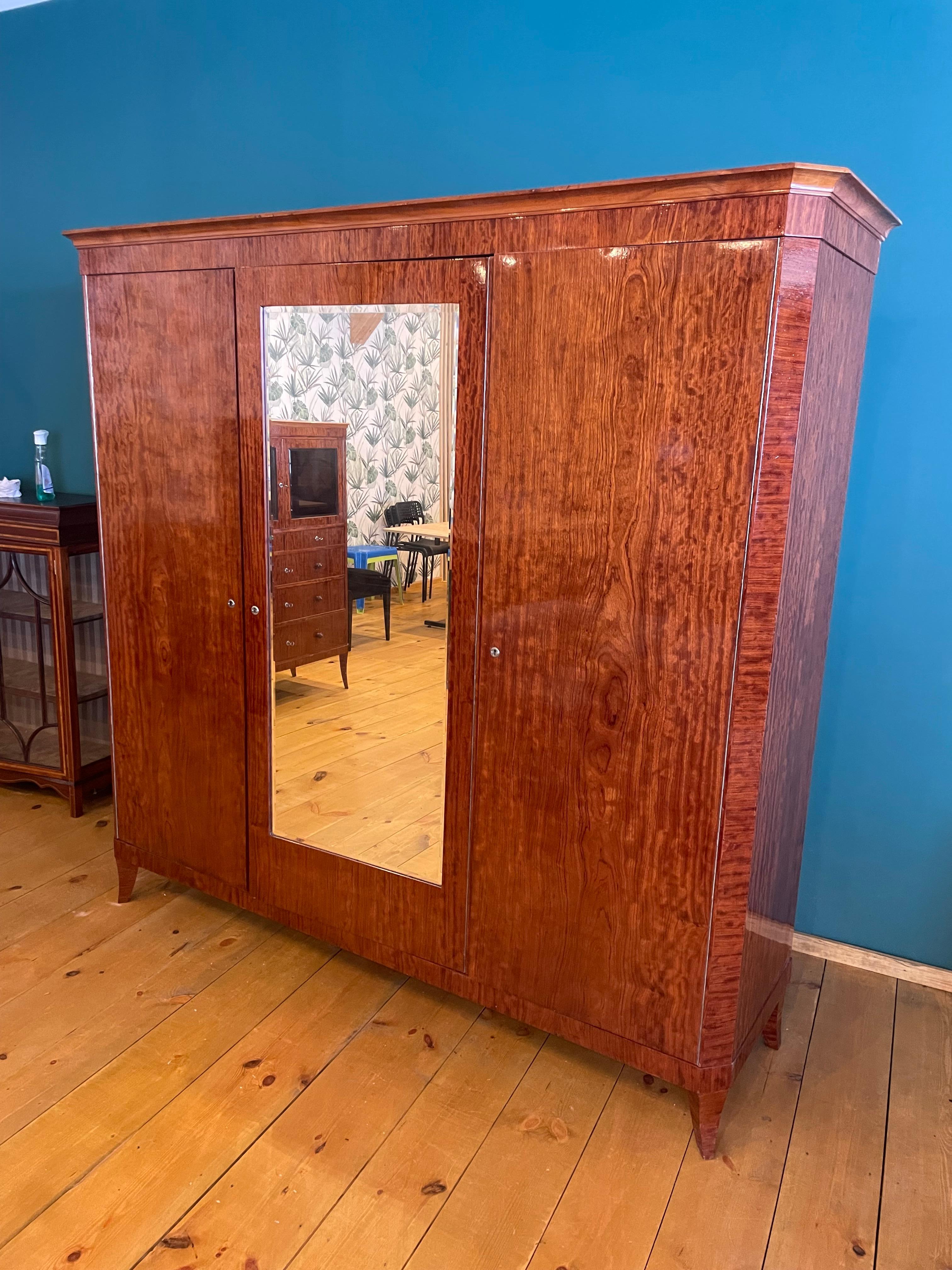 Biedermeier wardrobes Palisander .

The furniture from our workshop is manually covered with high-gloss shellac Laquer.